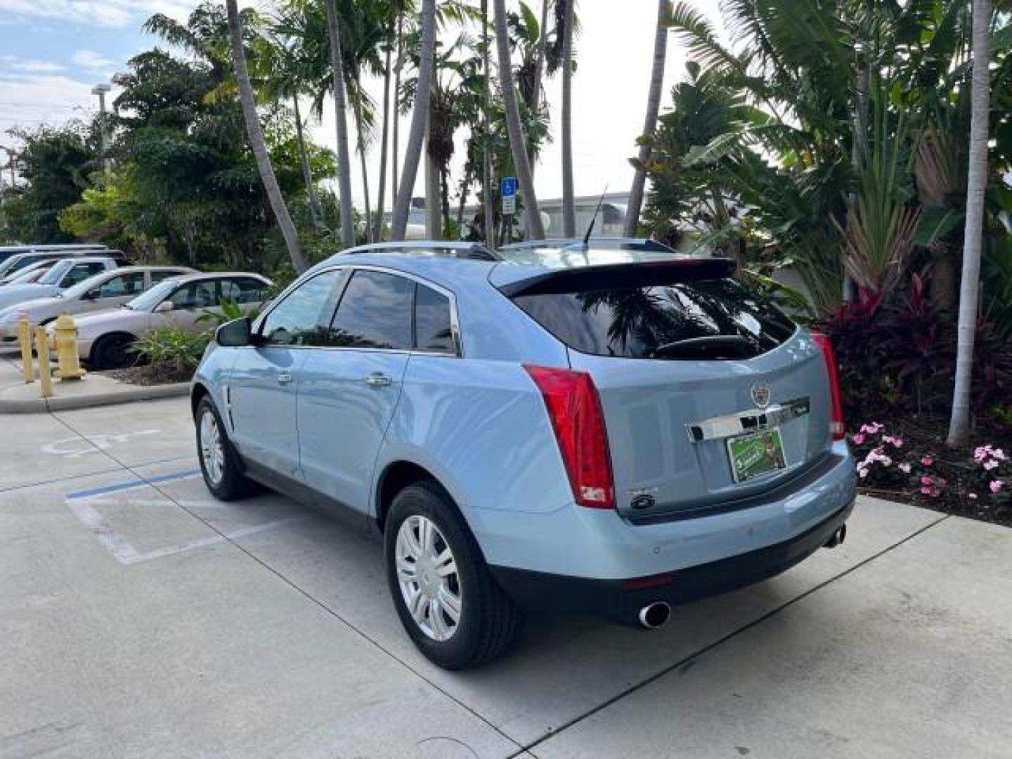 2011 Blue Frost Metalic /Shale w/Ebony accents Cadillac SRX Luxury Collection LOW MILES 40200 (3GYFNAEY7BS) with an 3.0L VVT DOHC V6 SIDI Engine engine, Automatic transmission, located at 4701 North Dixie Hwy, Pompano Beach, FL, 33064, (954) 422-2889, 26.240938, -80.123474 - OUR WEBPAGE FLORIDACARS1.COM HAS OVER 100 PHOTOS AND FREE CARFAX LINK 2011 CADILLAC SRX LUXURY COLLECTION NEW $43,240 ROAD READY VIN: 3GYFNAEY7BS633830 NO ACCIDENTS NO RECALLS 4 DOOR WAGON/ FLORIDA OWNER BLUETOOTH 3.0L V6 F DOHC 24V POWER PANORAMIC SUNROOF GASOLINE BACK UP CAMERA PARK SENSORS FRONT - Photo#5