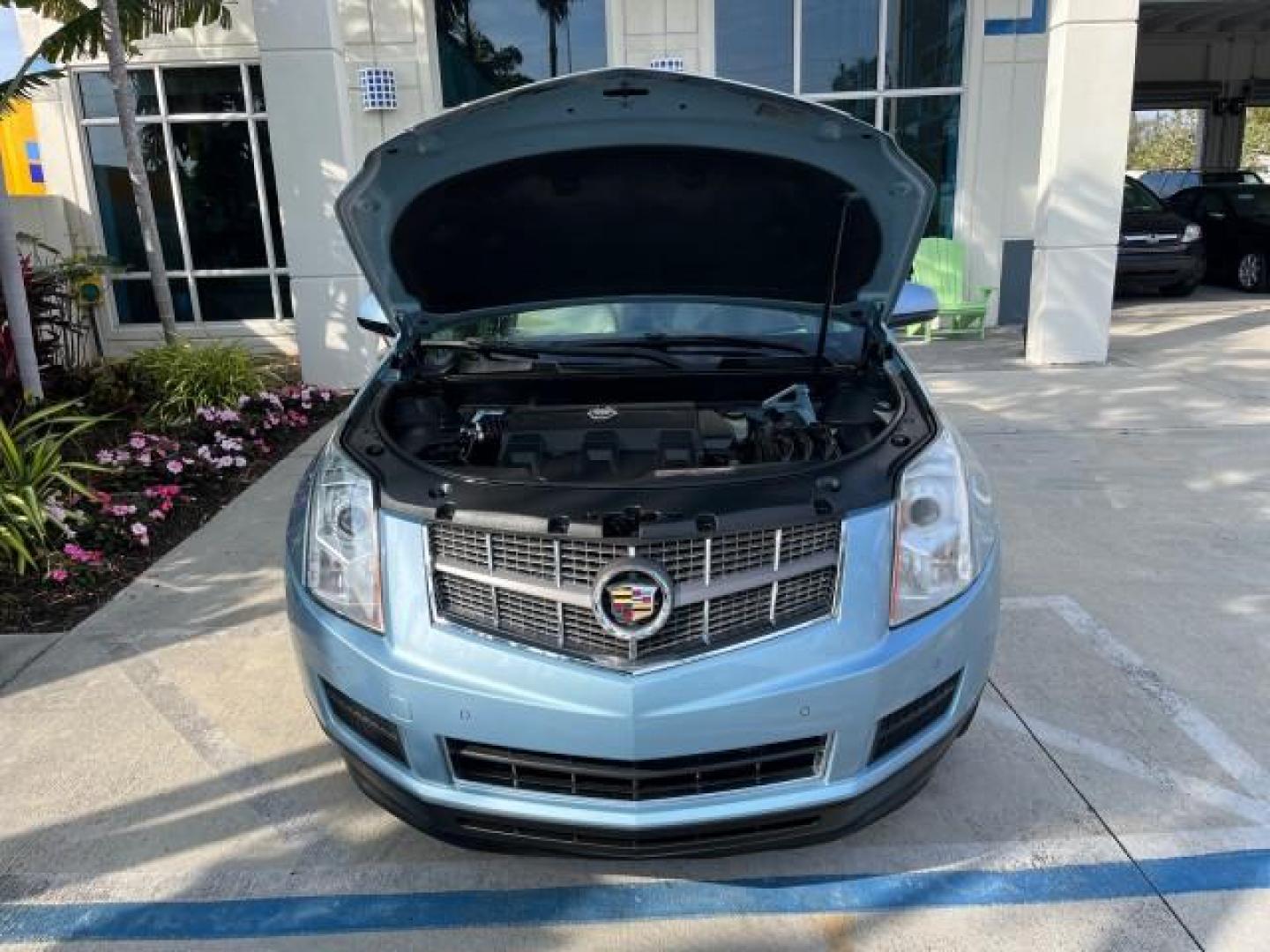 2011 Blue Frost Metalic /Shale w/Ebony accents Cadillac SRX Luxury Collection LOW MILES 40200 (3GYFNAEY7BS) with an 3.0L VVT DOHC V6 SIDI Engine engine, Automatic transmission, located at 4701 North Dixie Hwy, Pompano Beach, FL, 33064, (954) 422-2889, 26.240938, -80.123474 - OUR WEBPAGE FLORIDACARS1.COM HAS OVER 100 PHOTOS AND FREE CARFAX LINK 2011 CADILLAC SRX LUXURY COLLECTION NEW $43,240 ROAD READY VIN: 3GYFNAEY7BS633830 NO ACCIDENTS NO RECALLS 4 DOOR WAGON/ FLORIDA OWNER BLUETOOTH 3.0L V6 F DOHC 24V POWER PANORAMIC SUNROOF GASOLINE BACK UP CAMERA PARK SENSORS FRONT - Photo#78