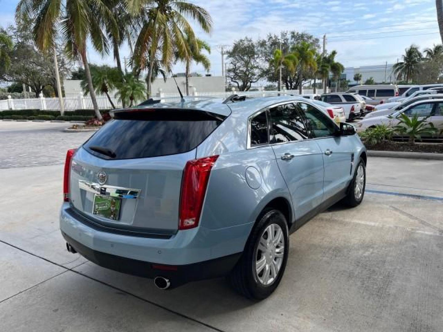 2011 Blue Frost Metalic /Shale w/Ebony accents Cadillac SRX Luxury Collection LOW MILES 40200 (3GYFNAEY7BS) with an 3.0L VVT DOHC V6 SIDI Engine engine, Automatic transmission, located at 4701 North Dixie Hwy, Pompano Beach, FL, 33064, (954) 422-2889, 26.240938, -80.123474 - OUR WEBPAGE FLORIDACARS1.COM HAS OVER 100 PHOTOS AND FREE CARFAX LINK 2011 CADILLAC SRX LUXURY COLLECTION NEW $43,240 ROAD READY VIN: 3GYFNAEY7BS633830 NO ACCIDENTS NO RECALLS 4 DOOR WAGON/ FLORIDA OWNER BLUETOOTH 3.0L V6 F DOHC 24V POWER PANORAMIC SUNROOF GASOLINE BACK UP CAMERA PARK SENSORS FRONT - Photo#7