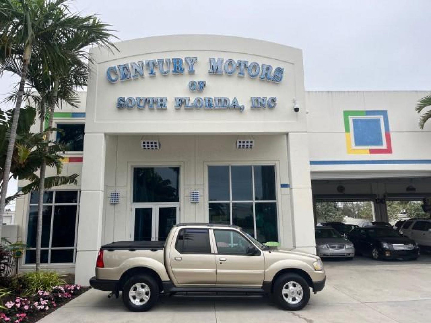 2003 Harvest Gold Metallic /Medium Pebble Ford Explorer Sport Trac XLT LOW MILES 75,818 (1FMZU67E33U) with an 4.0L SOHC MPFI V6 Engine engine, Automatic transmission, located at 4701 North Dixie Hwy, Pompano Beach, FL, 33064, (954) 422-2889, 26.240938, -80.123474 - 2003 FORD EXPLORER SPORT TRAC XLS NEW $28,720 ROAD READY VIN: 1FMZU67E33UA59584 NO ACCIDENTS NO RECALLS SPORT PICKUP BACK UP CAMERA FLORIDA OWNER XLS 4.0L V6 F SOHC NEW LIKE TIRES LOW MILES 75,818 GASOLINE POWER MIRRORS 10 SERVICE RECORDS REAR WHEEL DRIVE POWER SEATS 4.2FT BED 4.0L V6 4.2' Bed Lengt - Photo#0