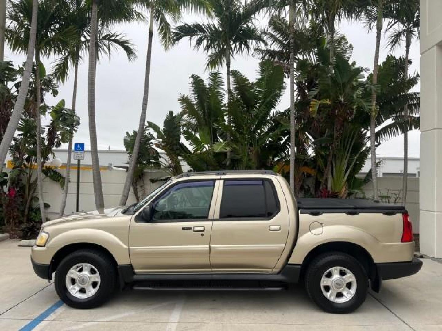 2003 Harvest Gold Metallic /Medium Pebble Ford Explorer Sport Trac XLT LOW MILES 75,818 (1FMZU67E33U) with an 4.0L SOHC MPFI V6 Engine engine, Automatic transmission, located at 4701 North Dixie Hwy, Pompano Beach, FL, 33064, (954) 422-2889, 26.240938, -80.123474 - 2003 FORD EXPLORER SPORT TRAC XLS NEW $28,720 ROAD READY VIN: 1FMZU67E33UA59584 NO ACCIDENTS NO RECALLS SPORT PICKUP BACK UP CAMERA FLORIDA OWNER XLS 4.0L V6 F SOHC NEW LIKE TIRES LOW MILES 75,818 GASOLINE POWER MIRRORS 10 SERVICE RECORDS REAR WHEEL DRIVE POWER SEATS 4.2FT BED 4.0L V6 4.2' Bed Lengt - Photo#4