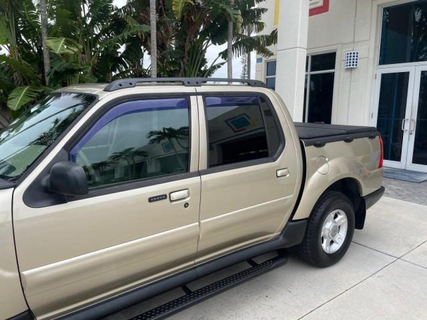 2003 Harvest Gold Metallic /Medium Pebble Ford Explorer Sport Trac XLT LOW MILES 75,818 (1FMZU67E33U) with an 4.0L SOHC MPFI V6 Engine engine, Automatic transmission, located at 4701 North Dixie Hwy, Pompano Beach, FL, 33064, (954) 422-2889, 26.240938, -80.123474 - 2003 FORD EXPLORER SPORT TRAC XLS NEW $28,720 ROAD READY VIN: 1FMZU67E33UA59584 NO ACCIDENTS NO RECALLS SPORT PICKUP BACK UP CAMERA FLORIDA OWNER XLS 4.0L V6 F SOHC NEW LIKE TIRES LOW MILES 75,818 GASOLINE POWER MIRRORS 10 SERVICE RECORDS REAR WHEEL DRIVE POWER SEATS 4.2FT BED 4.0L V6 4.2' Bed Lengt - Photo#72