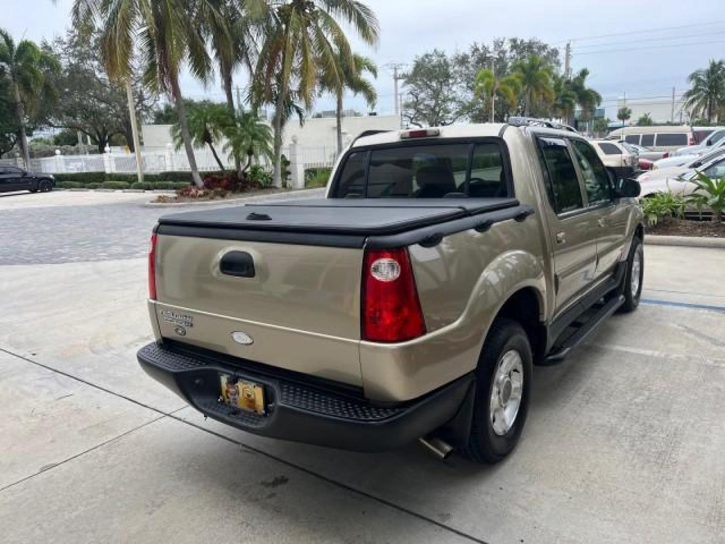 2003 Harvest Gold Metallic /Medium Pebble Ford Explorer Sport Trac XLT LOW MILES 75,818 (1FMZU67E33U) with an 4.0L SOHC MPFI V6 Engine engine, Automatic transmission, located at 4701 North Dixie Hwy, Pompano Beach, FL, 33064, (954) 422-2889, 26.240938, -80.123474 - 2003 FORD EXPLORER SPORT TRAC XLS NEW $28,720 ROAD READY VIN: 1FMZU67E33UA59584 NO ACCIDENTS NO RECALLS SPORT PICKUP BACK UP CAMERA FLORIDA OWNER XLS 4.0L V6 F SOHC NEW LIKE TIRES LOW MILES 75,818 GASOLINE POWER MIRRORS 10 SERVICE RECORDS REAR WHEEL DRIVE POWER SEATS 4.2FT BED 4.0L V6 4.2' Bed Lengt - Photo#7