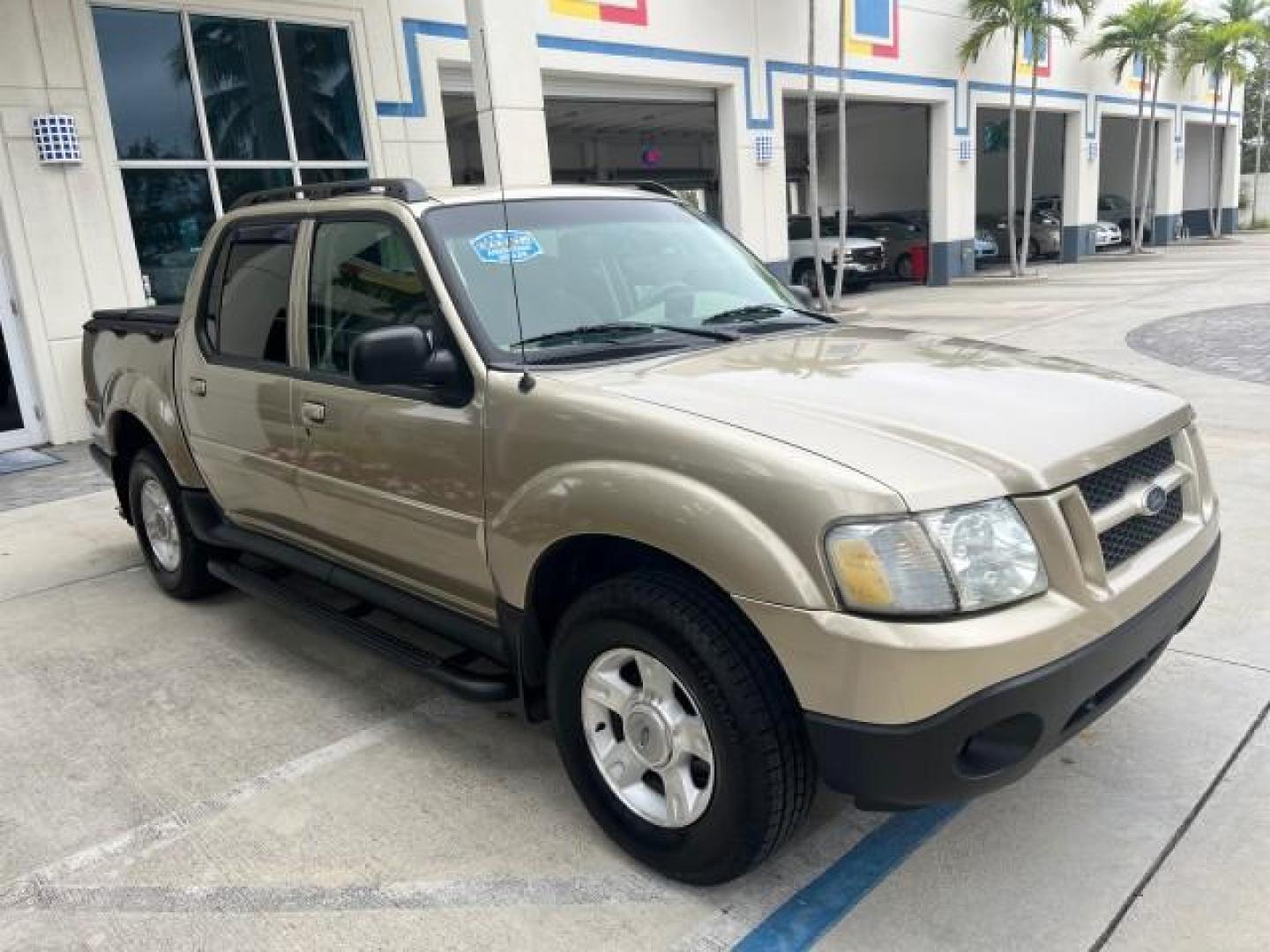 2003 Harvest Gold Metallic /Medium Pebble Ford Explorer Sport Trac XLT LOW MILES 75,818 (1FMZU67E33U) with an 4.0L SOHC MPFI V6 Engine engine, Automatic transmission, located at 4701 North Dixie Hwy, Pompano Beach, FL, 33064, (954) 422-2889, 26.240938, -80.123474 - 2003 FORD EXPLORER SPORT TRAC XLS NEW $28,720 ROAD READY VIN: 1FMZU67E33UA59584 NO ACCIDENTS NO RECALLS SPORT PICKUP BACK UP CAMERA FLORIDA OWNER XLS 4.0L V6 F SOHC NEW LIKE TIRES LOW MILES 75,818 GASOLINE POWER MIRRORS 10 SERVICE RECORDS REAR WHEEL DRIVE POWER SEATS 4.2FT BED 4.0L V6 4.2' Bed Lengt - Photo#87