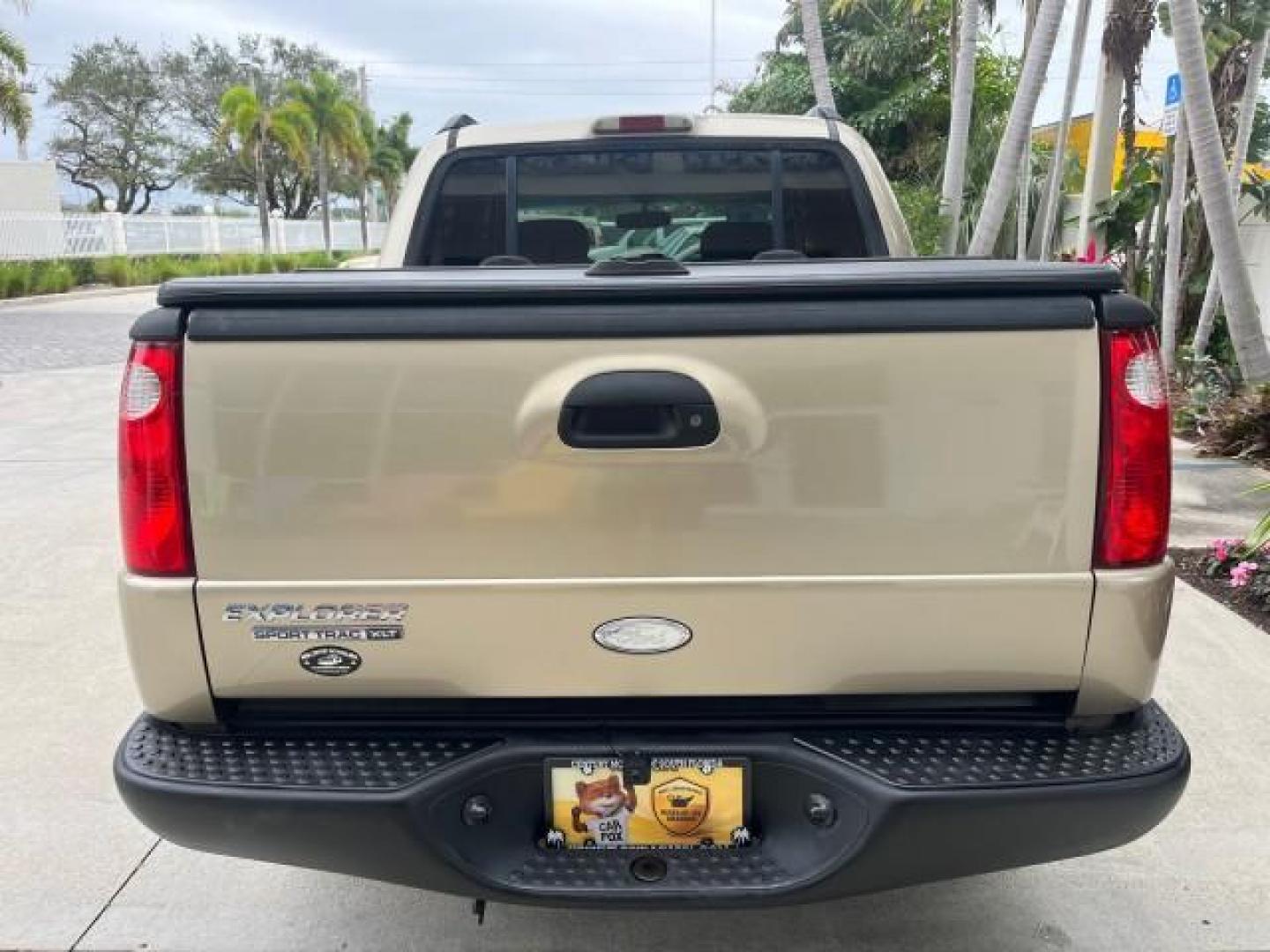 2003 Harvest Gold Metallic /Medium Pebble Ford Explorer Sport Trac XLT LOW MILES 75,818 (1FMZU67E33U) with an 4.0L SOHC MPFI V6 Engine engine, Automatic transmission, located at 4701 North Dixie Hwy, Pompano Beach, FL, 33064, (954) 422-2889, 26.240938, -80.123474 - 2003 FORD EXPLORER SPORT TRAC XLS NEW $28,720 ROAD READY VIN: 1FMZU67E33UA59584 NO ACCIDENTS NO RECALLS SPORT PICKUP BACK UP CAMERA FLORIDA OWNER XLS 4.0L V6 F SOHC NEW LIKE TIRES LOW MILES 75,818 GASOLINE POWER MIRRORS 10 SERVICE RECORDS REAR WHEEL DRIVE POWER SEATS 4.2FT BED 4.0L V6 4.2' Bed Lengt - Photo#90