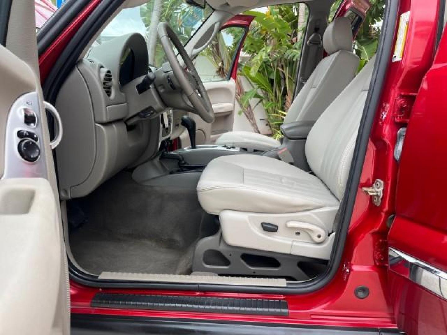 2006 Inferno Red Crystal Pearl /Khaki Jeep Liberty limited 4wd low miles (1J4GL58K36W) with an 3.7L V6 Engine engine, Automatic transmission, located at 4701 North Dixie Hwy, Pompano Beach, FL, 33064, (954) 422-2889, 26.240938, -80.123474 - 2006 JEEP LIBERTY LIMITED NEW $ 29,370 ROAD READY VIN: 1J4GL58K36W187677 NO ACCIDENTS 4X4 4 DOOR WAGON/SPORT UTILITY ON DEMAND 4WD 3.7L V6 F POWER LEATHER SEATS GASOLINE LOW MILES 68,017 REAR WHEEL DRIVE W/ 4X4 FLORIDA OWNER 4WD 4WD Anti-Theft System Black Roof Rails Braking Assist Chrome Grille Cru - Photo#10