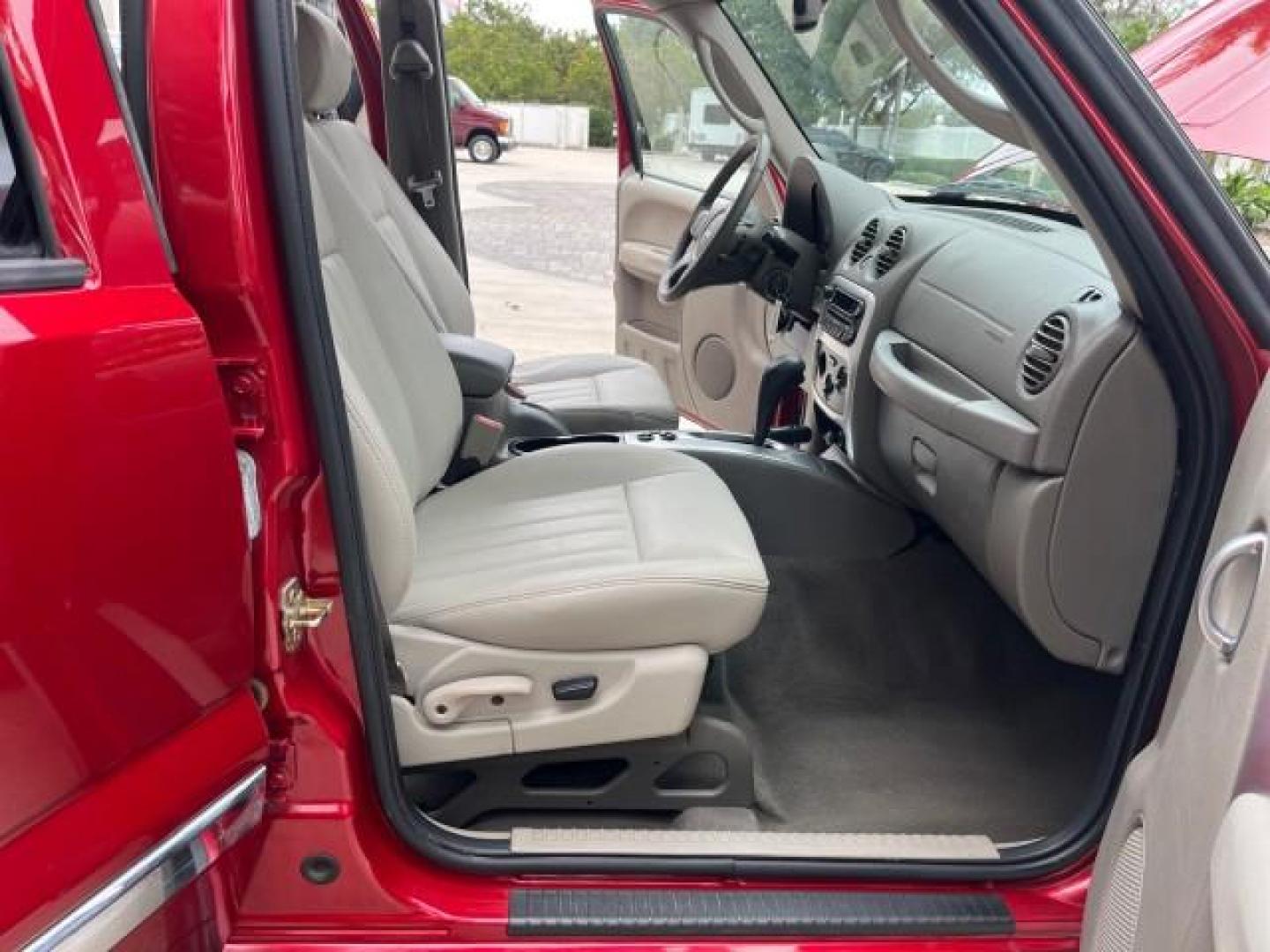 2006 Inferno Red Crystal Pearl /Khaki Jeep Liberty limited 4wd low miles (1J4GL58K36W) with an 3.7L V6 Engine engine, Automatic transmission, located at 4701 North Dixie Hwy, Pompano Beach, FL, 33064, (954) 422-2889, 26.240938, -80.123474 - 2006 JEEP LIBERTY LIMITED NEW $ 29,370 ROAD READY VIN: 1J4GL58K36W187677 NO ACCIDENTS 4X4 4 DOOR WAGON/SPORT UTILITY ON DEMAND 4WD 3.7L V6 F POWER LEATHER SEATS GASOLINE LOW MILES 68,017 REAR WHEEL DRIVE W/ 4X4 FLORIDA OWNER 4WD 4WD Anti-Theft System Black Roof Rails Braking Assist Chrome Grille Cru - Photo#12