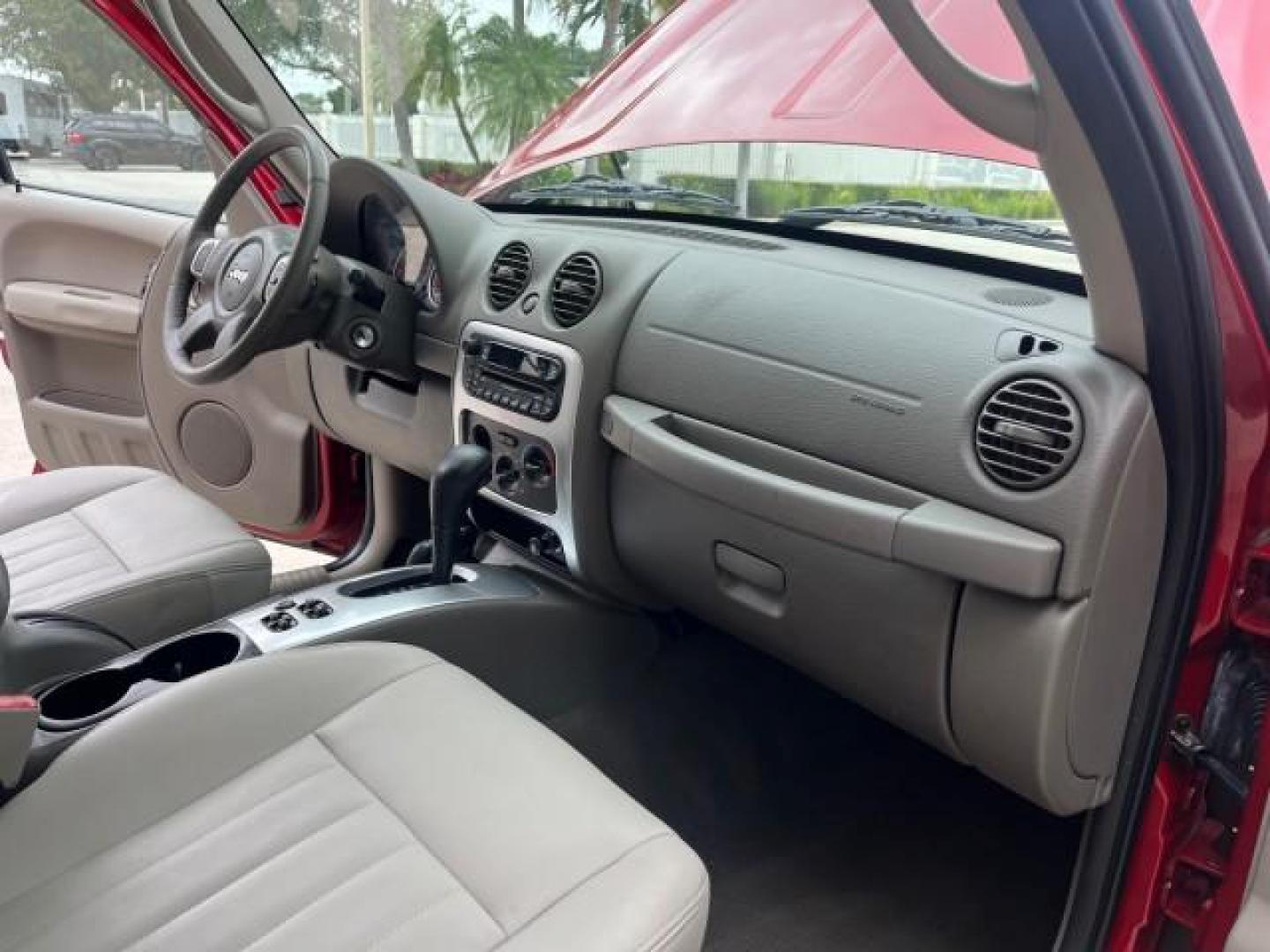 2006 Inferno Red Crystal Pearl /Khaki Jeep Liberty limited 4wd low miles (1J4GL58K36W) with an 3.7L V6 Engine engine, Automatic transmission, located at 4701 North Dixie Hwy, Pompano Beach, FL, 33064, (954) 422-2889, 26.240938, -80.123474 - 2006 JEEP LIBERTY LIMITED NEW $ 29,370 ROAD READY VIN: 1J4GL58K36W187677 NO ACCIDENTS 4X4 4 DOOR WAGON/SPORT UTILITY ON DEMAND 4WD 3.7L V6 F POWER LEATHER SEATS GASOLINE LOW MILES 68,017 REAR WHEEL DRIVE W/ 4X4 FLORIDA OWNER 4WD 4WD Anti-Theft System Black Roof Rails Braking Assist Chrome Grille Cru - Photo#27