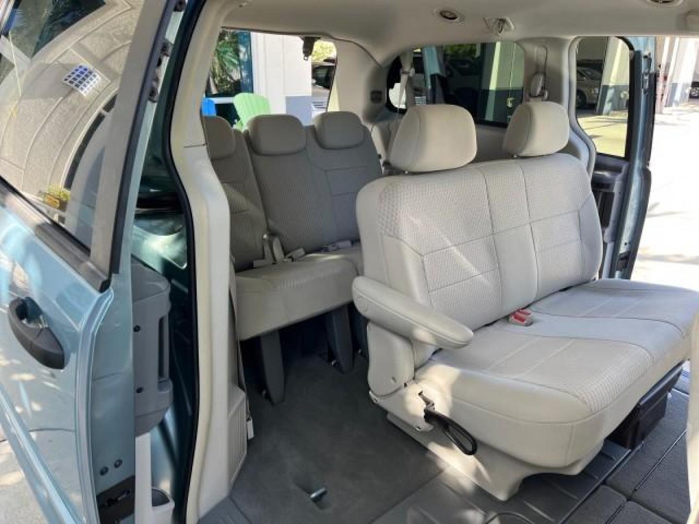 2008 Clearwater Blue Pearl /Md Slate Gray/Lt Shale Chrysler Town and Country LX LOW MILES 68,104 (2A8HR44H38R) with an 3.3L V6 Cylinder Engine engine, Automatic transmission, located at 4701 North Dixie Hwy, Pompano Beach, FL, 33064, (954) 422-2889, 26.240938, -80.123474 - OUR WEBPAGE FLORIDACARS1.COM HAS OVER 100 PHOTOS AND FREE CARFAX LINK 2008 CHRYSLER TOWN AND COUNTRY LX ROAD READY 3.3L V6 VIN: 2A8HR44H38R838730 NO ACCIDENTS VAN 24 MPG NO RECALLS 3.3L V6 F OHV 12V POWER MIRRORS 3 ROW SEATS GASOLINE DUAL ZONE AC 37 SERVICE RECORDS FRONT WHEEL DRIVE LOW MILES 68,104 - Photo#34