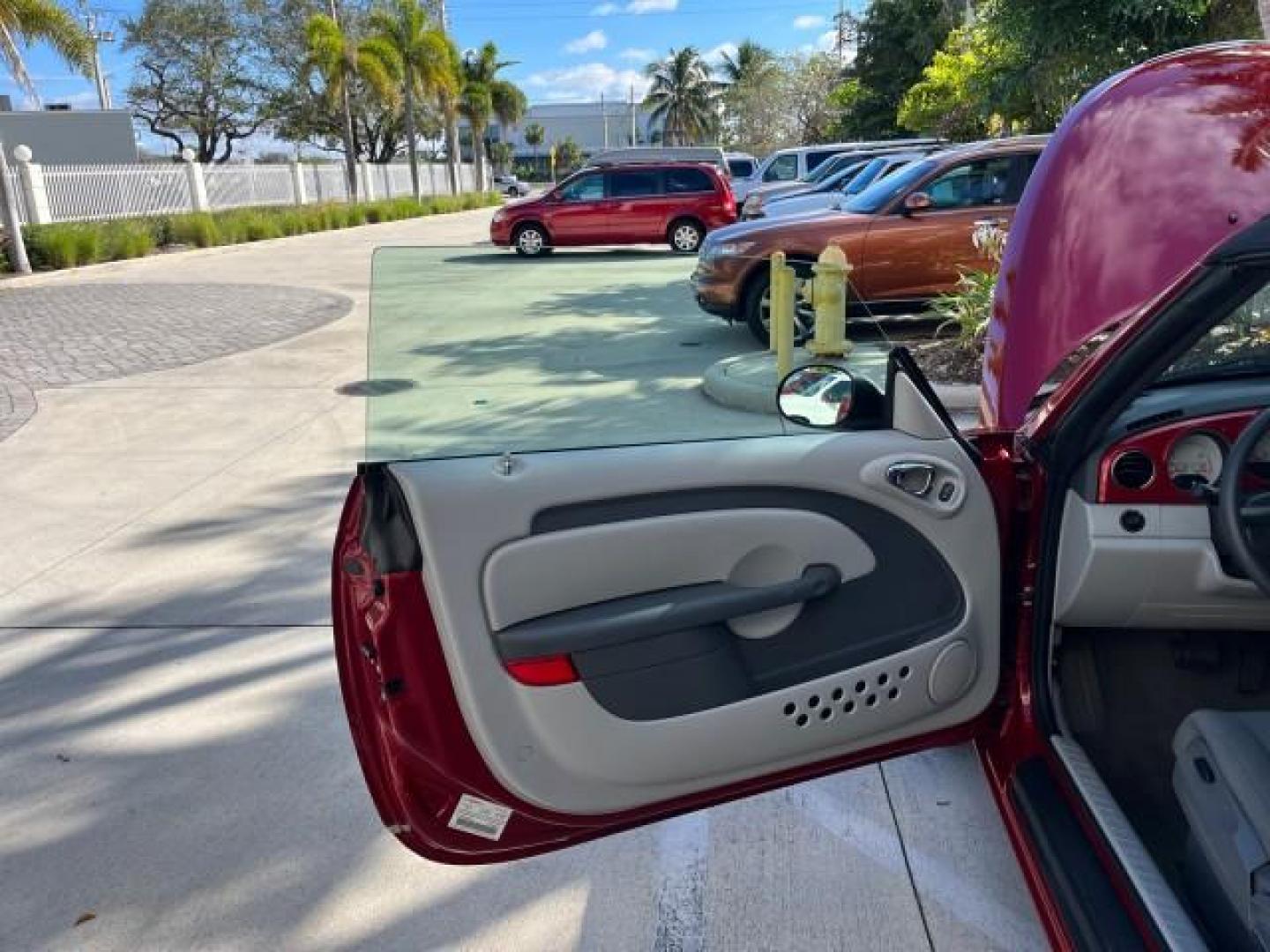 2008 Inferno Red Crystal Pearl /Pastel Pebble Beige Chrysler PT Cruiser CONV LOW MILES 31605 (3C3HY55X28T) with an 2.4L DOHC 16-Valve Turbo I4 Engine engine, Automatic transmission, located at 4701 North Dixie Hwy, Pompano Beach, FL, 33064, (954) 422-2889, 26.240938, -80.123474 - 2008 CHRYSLER PT CRUISER ROAD READY 2.4L I4 VIN: 3C3HY55X28T121906 NO ACCIDENTS NO RECALLS CONVERTIBLE FLORIDA OWNER POWER SEATS 2.4L I4 F DOHC 16V POWER CONVERTIBLE TOP GASOLINE 11 SERVICE RECORDS FRONT WHEEL DRIVE LOW MILES 31,605 Additional Airbags Anti-Theft System Cruise Control Curtain Airbags - Photo#10