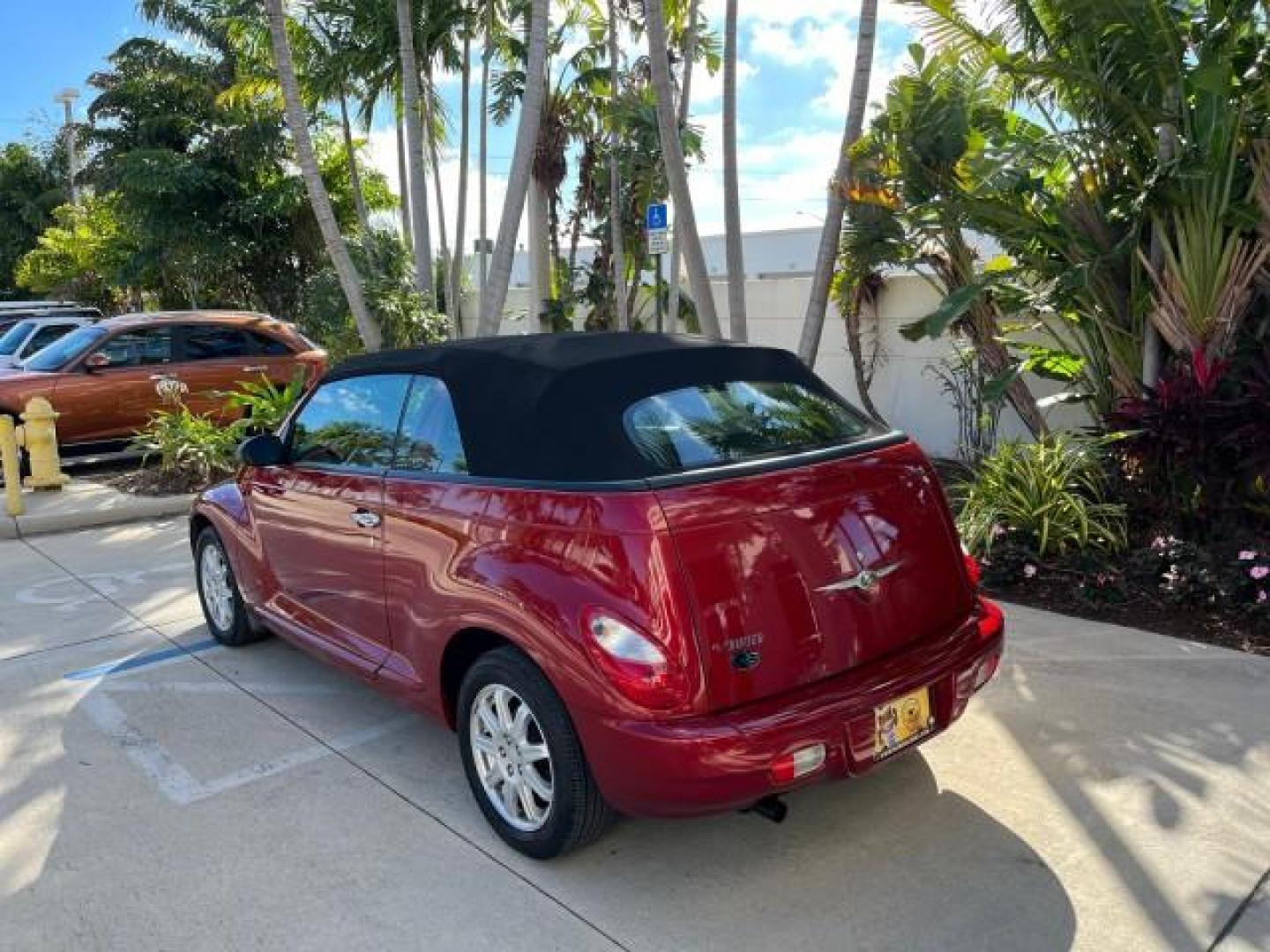 2008 Inferno Red Crystal Pearl /Pastel Pebble Beige Chrysler PT Cruiser CONV LOW MILES 31605 (3C3HY55X28T) with an 2.4L DOHC 16-Valve Turbo I4 Engine engine, Automatic transmission, located at 4701 North Dixie Hwy, Pompano Beach, FL, 33064, (954) 422-2889, 26.240938, -80.123474 - 2008 CHRYSLER PT CRUISER ROAD READY 2.4L I4 VIN: 3C3HY55X28T121906 NO ACCIDENTS NO RECALLS CONVERTIBLE FLORIDA OWNER POWER SEATS 2.4L I4 F DOHC 16V POWER CONVERTIBLE TOP GASOLINE 11 SERVICE RECORDS FRONT WHEEL DRIVE LOW MILES 31,605 Additional Airbags Anti-Theft System Cruise Control Curtain Airbags - Photo#5