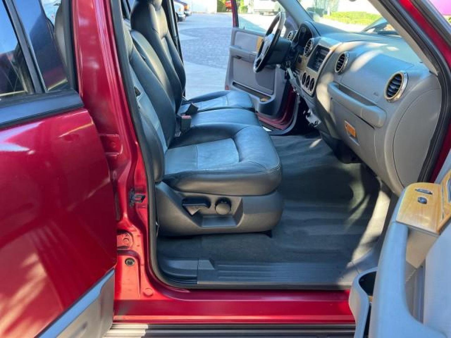 2004 Red Fire Metallic /Medium Flint Grey Ford Expedition XLS LOW MILES 54,849 (1FMRU13W74L) with an 4.6L SOHC SEFI V8 Triton Engine engine, Automatic transmission, located at 4701 North Dixie Hwy, Pompano Beach, FL, 33064, (954) 422-2889, 26.240938, -80.123474 - 2004 FORD EXPEDITION XLS NEW $ 33,235 ROAD READY VIN: 1FMRU13W74LB89943 FLORIDA OWNER 4.6L V8 4 DOOR WAGON/SPORT UTILITY LOW MILES 54,849 LEATHER 4.6L V8 F SOHC 16V 3 ROW SEATS NO RECALLS GASOLINE POWER MIRRORS AND SEATS REAR WHEEL DRIVE 6 SERVICE RECORDS Anti-Theft System Approach Lights Black Roof - Photo#12