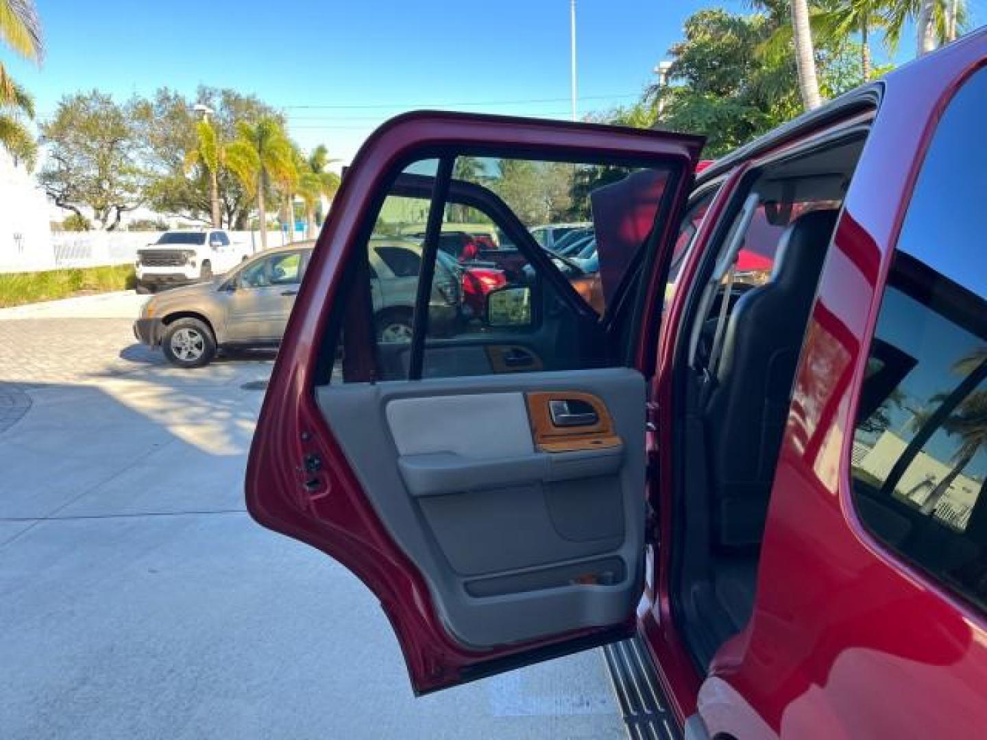 2004 Red Fire Metallic /Medium Flint Grey Ford Expedition XLS LOW MILES 54,849 (1FMRU13W74L) with an 4.6L SOHC SEFI V8 Triton Engine engine, Automatic transmission, located at 4701 North Dixie Hwy, Pompano Beach, FL, 33064, (954) 422-2889, 26.240938, -80.123474 - 2004 FORD EXPEDITION XLS NEW $ 33,235 ROAD READY VIN: 1FMRU13W74LB89943 FLORIDA OWNER 4.6L V8 4 DOOR WAGON/SPORT UTILITY LOW MILES 54,849 LEATHER 4.6L V8 F SOHC 16V 3 ROW SEATS NO RECALLS GASOLINE POWER MIRRORS AND SEATS REAR WHEEL DRIVE 6 SERVICE RECORDS Anti-Theft System Approach Lights Black Roof - Photo#13