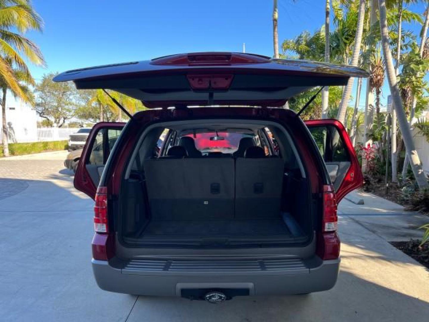 2004 Red Fire Metallic /Medium Flint Grey Ford Expedition XLS LOW MILES 54,849 (1FMRU13W74L) with an 4.6L SOHC SEFI V8 Triton Engine engine, Automatic transmission, located at 4701 North Dixie Hwy, Pompano Beach, FL, 33064, (954) 422-2889, 26.240938, -80.123474 - 2004 FORD EXPEDITION XLS NEW $ 33,235 ROAD READY VIN: 1FMRU13W74LB89943 FLORIDA OWNER 4.6L V8 4 DOOR WAGON/SPORT UTILITY LOW MILES 54,849 LEATHER 4.6L V8 F SOHC 16V 3 ROW SEATS NO RECALLS GASOLINE POWER MIRRORS AND SEATS REAR WHEEL DRIVE 6 SERVICE RECORDS Anti-Theft System Approach Lights Black Roof - Photo#16