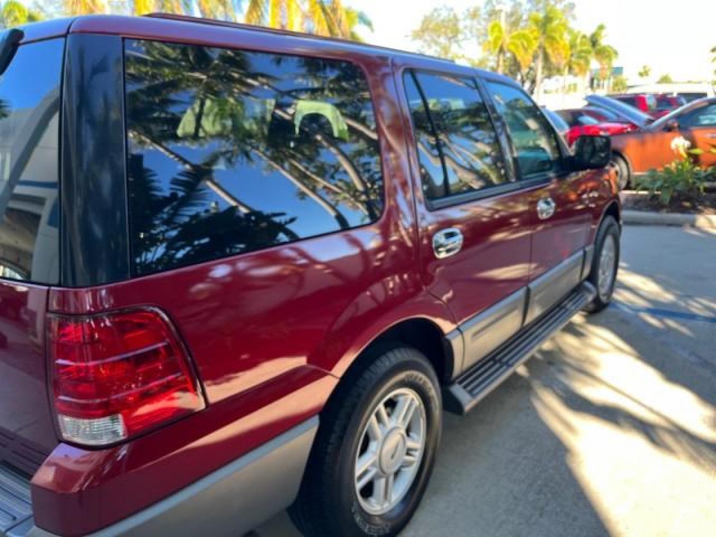 2004 Red Fire Metallic /Medium Flint Grey Ford Expedition XLS LOW MILES 54,849 (1FMRU13W74L) with an 4.6L SOHC SEFI V8 Triton Engine engine, Automatic transmission, located at 4701 North Dixie Hwy, Pompano Beach, FL, 33064, (954) 422-2889, 26.240938, -80.123474 - 2004 FORD EXPEDITION XLS NEW $ 33,235 ROAD READY VIN: 1FMRU13W74LB89943 FLORIDA OWNER 4.6L V8 4 DOOR WAGON/SPORT UTILITY LOW MILES 54,849 LEATHER 4.6L V8 F SOHC 16V 3 ROW SEATS NO RECALLS GASOLINE POWER MIRRORS AND SEATS REAR WHEEL DRIVE 6 SERVICE RECORDS Anti-Theft System Approach Lights Black Roof - Photo#94