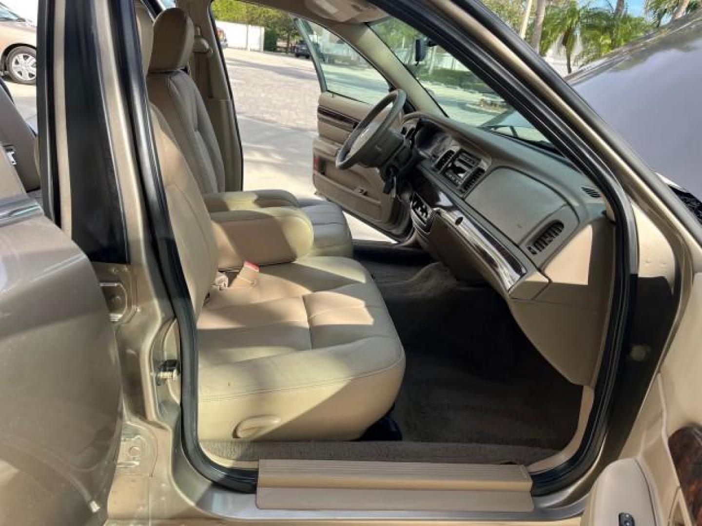 2005 Arizona Beige Metallic /Light Flint Mercury Grand Marquis 1 FL GS LOW MILES 43,746 (2MEFM74W95X) with an 4.6L OHC SEFI V8 Engine engine, Automatic transmission, located at 4701 North Dixie Hwy, Pompano Beach, FL, 33064, (954) 422-2889, 26.240938, -80.123474 - 2005 MERCURY GRAND MARQUIS GS ROAD READY 4.6L V8 VIN: 2MEFM74W95X643217 NO RECALLS POWER MIRRORS SEDAN 4 DR FLORIDA OWNER 4.6L V8 F DOHC LOW MILES 43,746 GASOLINE 13 SERVICE RECORDS REAR WHEEL DRIVE POWER LEATHER SEATS ABS Brakes AM/FM Stereo Air Conditioning Automatic Transmission CD Audio Cloth Se - Photo#12