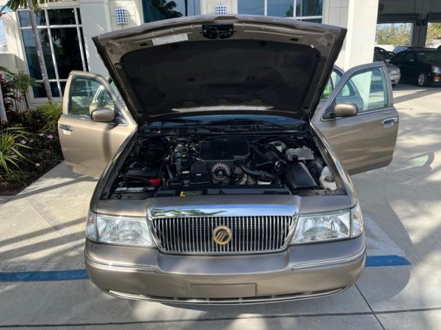 2005 Arizona Beige Metallic /Light Flint Mercury Grand Marquis 1 FL GS LOW MILES 43,746 (2MEFM74W95X) with an 4.6L OHC SEFI V8 Engine engine, Automatic transmission, located at 4701 North Dixie Hwy, Pompano Beach, FL, 33064, (954) 422-2889, 26.240938, -80.123474 - 2005 MERCURY GRAND MARQUIS GS ROAD READY 4.6L V8 VIN: 2MEFM74W95X643217 NO RECALLS POWER MIRRORS SEDAN 4 DR FLORIDA OWNER 4.6L V8 F DOHC LOW MILES 43,746 GASOLINE 13 SERVICE RECORDS REAR WHEEL DRIVE POWER LEATHER SEATS ABS Brakes AM/FM Stereo Air Conditioning Automatic Transmission CD Audio Cloth Se - Photo#16