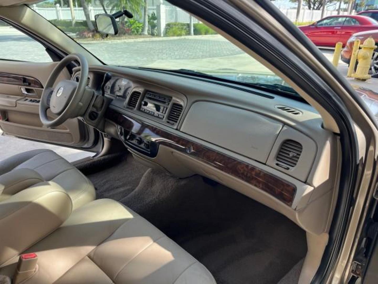 2005 Arizona Beige Metallic /Light Flint Mercury Grand Marquis 1 FL GS LOW MILES 43,746 (2MEFM74W95X) with an 4.6L OHC SEFI V8 Engine engine, Automatic transmission, located at 4701 North Dixie Hwy, Pompano Beach, FL, 33064, (954) 422-2889, 26.240938, -80.123474 - 2005 MERCURY GRAND MARQUIS GS ROAD READY 4.6L V8 VIN: 2MEFM74W95X643217 NO RECALLS POWER MIRRORS SEDAN 4 DR FLORIDA OWNER 4.6L V8 F DOHC LOW MILES 43,746 GASOLINE 13 SERVICE RECORDS REAR WHEEL DRIVE POWER LEATHER SEATS ABS Brakes AM/FM Stereo Air Conditioning Automatic Transmission CD Audio Cloth Se - Photo#26