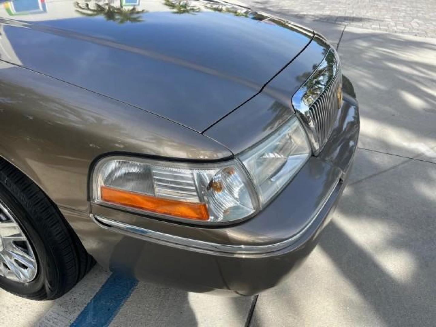 2005 Arizona Beige Metallic /Light Flint Mercury Grand Marquis 1 FL GS LOW MILES 43,746 (2MEFM74W95X) with an 4.6L OHC SEFI V8 Engine engine, Automatic transmission, located at 4701 North Dixie Hwy, Pompano Beach, FL, 33064, (954) 422-2889, 26.240938, -80.123474 - 2005 MERCURY GRAND MARQUIS GS ROAD READY 4.6L V8 VIN: 2MEFM74W95X643217 NO RECALLS POWER MIRRORS SEDAN 4 DR FLORIDA OWNER 4.6L V8 F DOHC LOW MILES 43,746 GASOLINE 13 SERVICE RECORDS REAR WHEEL DRIVE POWER LEATHER SEATS ABS Brakes AM/FM Stereo Air Conditioning Automatic Transmission CD Audio Cloth Se - Photo#66