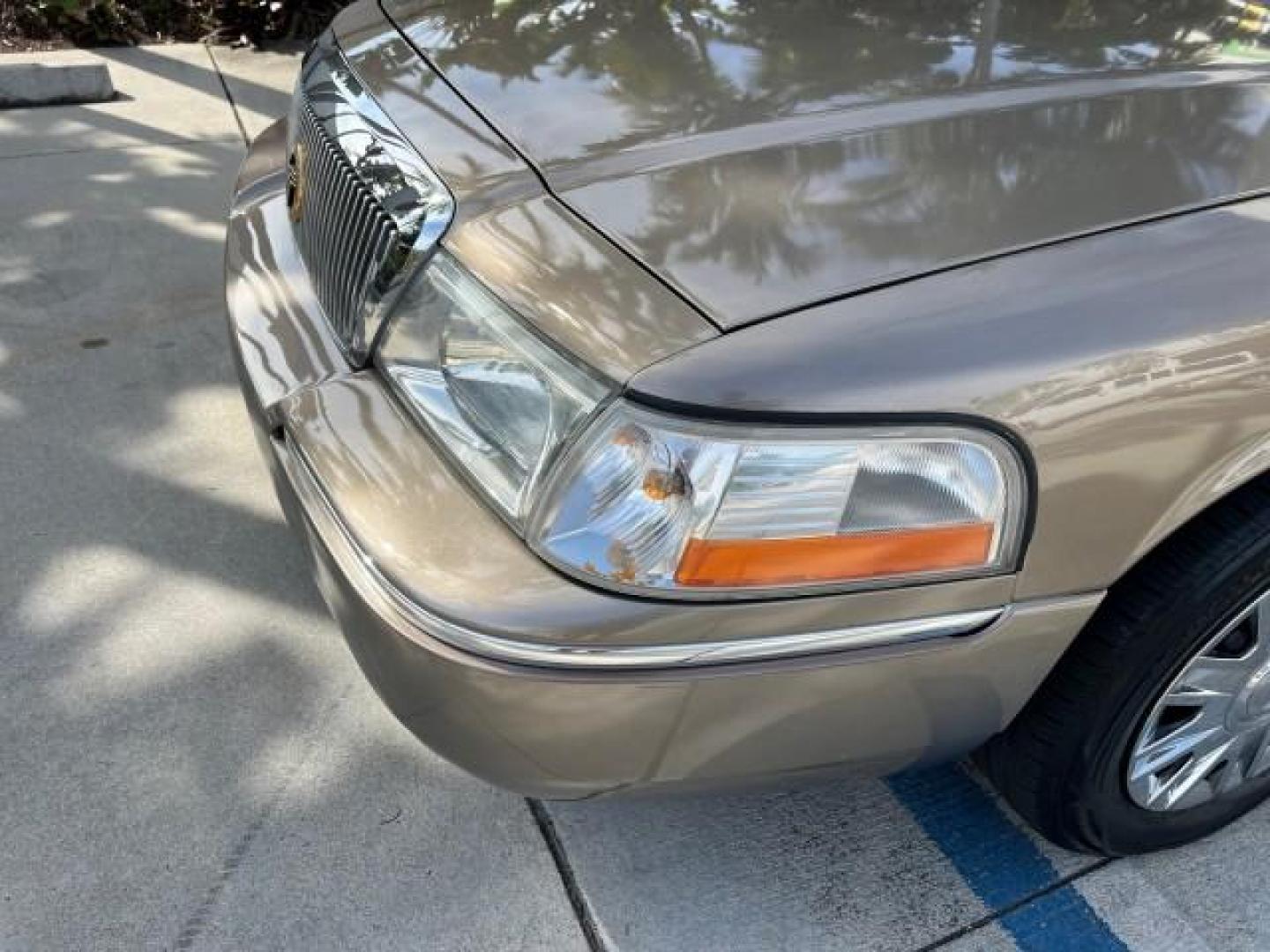 2005 Arizona Beige Metallic /Light Flint Mercury Grand Marquis 1 FL GS LOW MILES 43,746 (2MEFM74W95X) with an 4.6L OHC SEFI V8 Engine engine, Automatic transmission, located at 4701 North Dixie Hwy, Pompano Beach, FL, 33064, (954) 422-2889, 26.240938, -80.123474 - 2005 MERCURY GRAND MARQUIS GS ROAD READY 4.6L V8 VIN: 2MEFM74W95X643217 NO RECALLS POWER MIRRORS SEDAN 4 DR FLORIDA OWNER 4.6L V8 F DOHC LOW MILES 43,746 GASOLINE 13 SERVICE RECORDS REAR WHEEL DRIVE POWER LEATHER SEATS ABS Brakes AM/FM Stereo Air Conditioning Automatic Transmission CD Audio Cloth Se - Photo#67