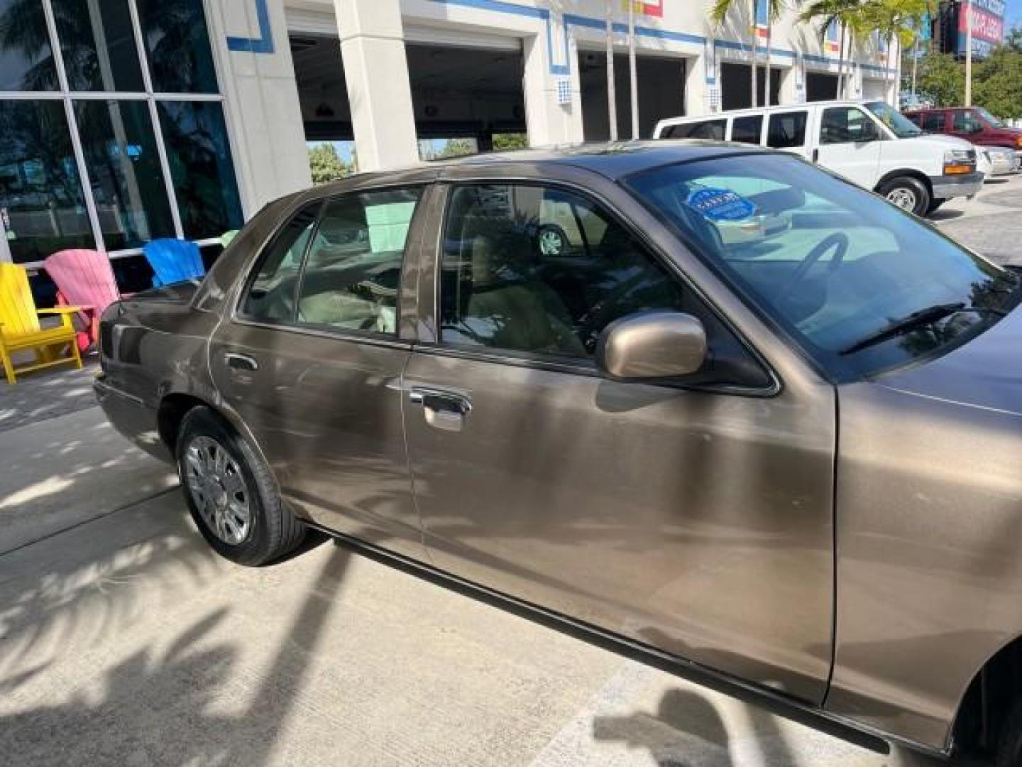 2005 Arizona Beige Metallic /Light Flint Mercury Grand Marquis 1 FL GS LOW MILES 43,746 (2MEFM74W95X) with an 4.6L OHC SEFI V8 Engine engine, Automatic transmission, located at 4701 North Dixie Hwy, Pompano Beach, FL, 33064, (954) 422-2889, 26.240938, -80.123474 - 2005 MERCURY GRAND MARQUIS GS ROAD READY 4.6L V8 VIN: 2MEFM74W95X643217 NO RECALLS POWER MIRRORS SEDAN 4 DR FLORIDA OWNER 4.6L V8 F DOHC LOW MILES 43,746 GASOLINE 13 SERVICE RECORDS REAR WHEEL DRIVE POWER LEATHER SEATS ABS Brakes AM/FM Stereo Air Conditioning Automatic Transmission CD Audio Cloth Se - Photo#68