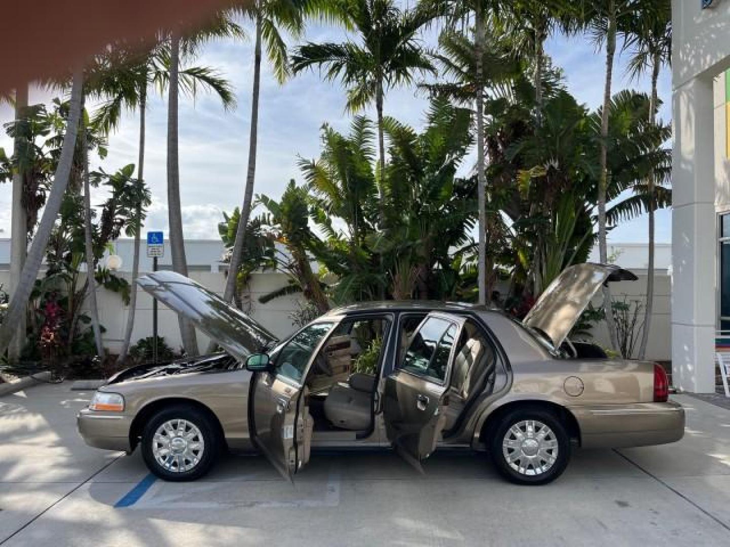 2005 Arizona Beige Metallic /Light Flint Mercury Grand Marquis 1 FL GS LOW MILES 43,746 (2MEFM74W95X) with an 4.6L OHC SEFI V8 Engine engine, Automatic transmission, located at 4701 North Dixie Hwy, Pompano Beach, FL, 33064, (954) 422-2889, 26.240938, -80.123474 - 2005 MERCURY GRAND MARQUIS GS ROAD READY 4.6L V8 VIN: 2MEFM74W95X643217 NO RECALLS POWER MIRRORS SEDAN 4 DR FLORIDA OWNER 4.6L V8 F DOHC LOW MILES 43,746 GASOLINE 13 SERVICE RECORDS REAR WHEEL DRIVE POWER LEATHER SEATS ABS Brakes AM/FM Stereo Air Conditioning Automatic Transmission CD Audio Cloth Se - Photo#8