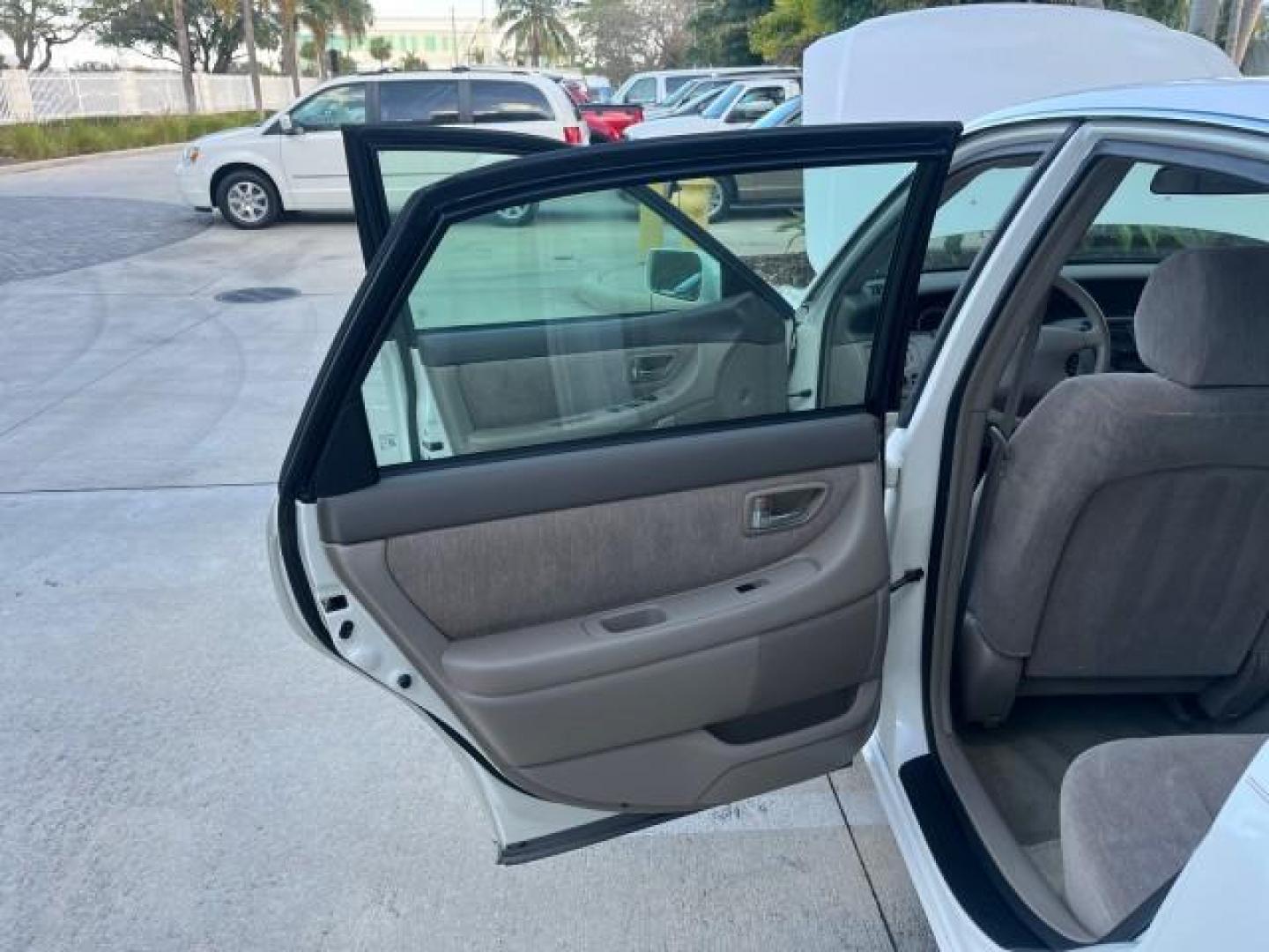 2001 Diamond White Pearl /Stone Toyota Avalon XL w/Bucket Seats LOW MILES 56,967 (4T1BF28B31U) with an 3.0L 4-Cam MPFI 24-Valve V6 Aluminum Alloy Engine engine, Automatic transmission, located at 4701 North Dixie Hwy, Pompano Beach, FL, 33064, (954) 422-2889, 26.240938, -80.123474 - 2001 TOYOTA AVALON XL ROAD READY 29 MPG VIN: 4T1BF28B31U157763 LOW MILES 56,967 SEDAN 4 DR 1 OWNER 3.0L V6 3.0L V6 F DOHC 24V NO RECALLS GASOLINE POWER SEATS FRONT WHEEL DRIVE NONE-SMOKER POWER MIRRORS Approach Lights Cruise Control FWD Front Bucket Seats Side Airbags THIS IS ONE OF THE NICEST AVALO - Photo#13