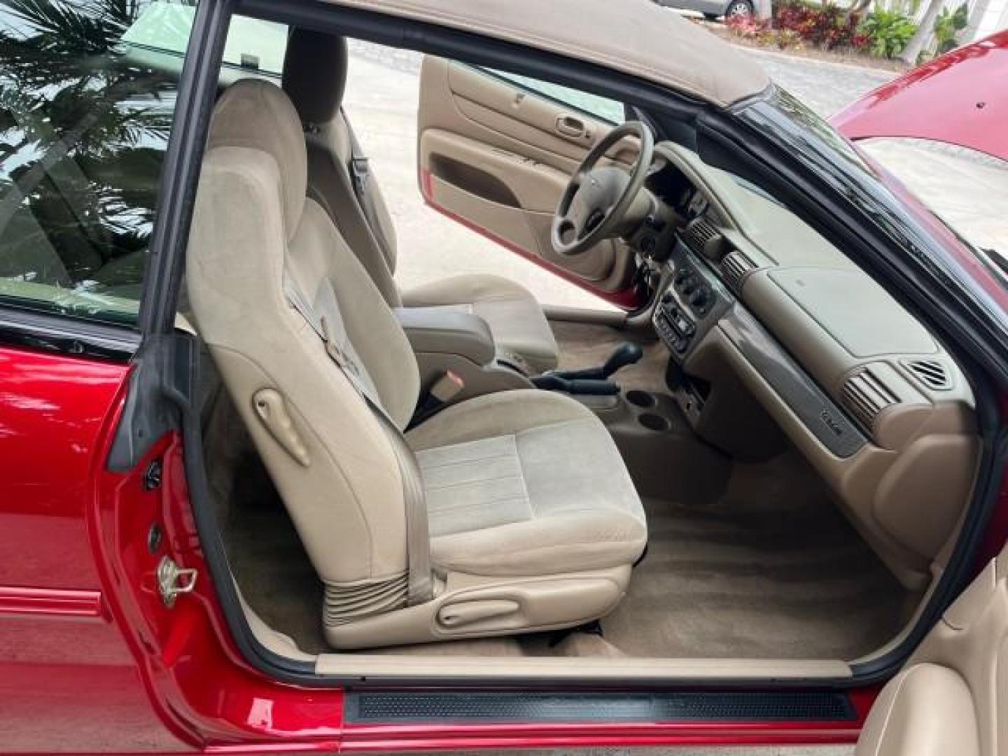 2004 Inferno Red Tinted Pearl /Dark Slate Gray Chrysler Sebring GTC LOW MILES 53,283 (1C3EL75R64N) with an 2.7L MPI DOHC 24-Valve V6 Engine engine, Automatic transmission, located at 4701 North Dixie Hwy, Pompano Beach, FL, 33064, (954) 422-2889, 26.240938, -80.123474 - 2004 CHRYSLER SEBRING GTC ROAD READY 2.7L V6 VIN: 1C3EL75R64N141665 NO ACCIDENTS CONVERTIBLE NO RECALLS 28 MPG 2.7L V6 F DOHC POWER CONVERTIBLE TOP GASOLINE POWER MIRRORS LOW MILES 53,283 FRONT WHEEL DRIVE POWER SEATS 12 SERVICE RECORDS Approach Lights Cruise Control Electronic Traction Control FWD - Photo#13