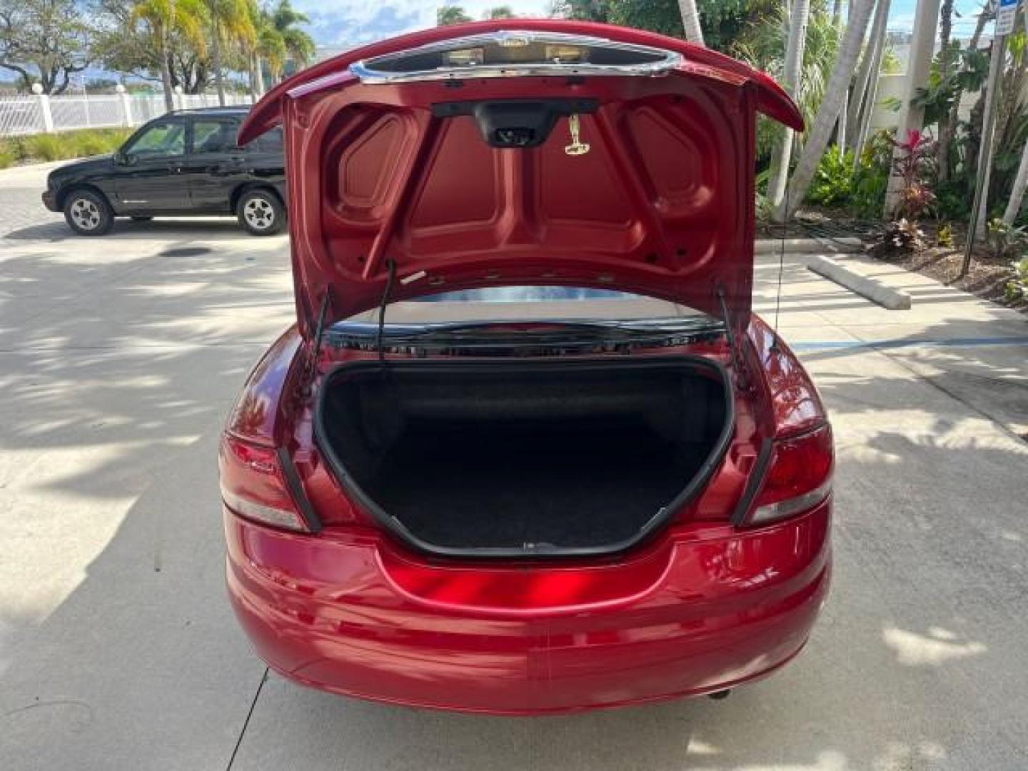 2004 Inferno Red Tinted Pearl /Dark Slate Gray Chrysler Sebring GTC LOW MILES 53,283 (1C3EL75R64N) with an 2.7L MPI DOHC 24-Valve V6 Engine engine, Automatic transmission, located at 4701 North Dixie Hwy, Pompano Beach, FL, 33064, (954) 422-2889, 26.240938, -80.123474 - 2004 CHRYSLER SEBRING GTC ROAD READY 2.7L V6 VIN: 1C3EL75R64N141665 NO ACCIDENTS CONVERTIBLE NO RECALLS 28 MPG 2.7L V6 F DOHC POWER CONVERTIBLE TOP GASOLINE POWER MIRRORS LOW MILES 53,283 FRONT WHEEL DRIVE POWER SEATS 12 SERVICE RECORDS Approach Lights Cruise Control Electronic Traction Control FWD - Photo#57