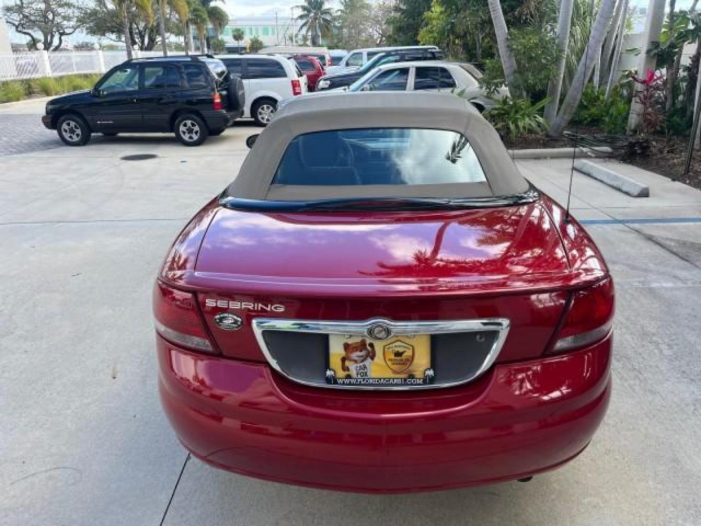 2004 Inferno Red Tinted Pearl /Dark Slate Gray Chrysler Sebring GTC LOW MILES 53,283 (1C3EL75R64N) with an 2.7L MPI DOHC 24-Valve V6 Engine engine, Automatic transmission, located at 4701 North Dixie Hwy, Pompano Beach, FL, 33064, (954) 422-2889, 26.240938, -80.123474 - 2004 CHRYSLER SEBRING GTC ROAD READY 2.7L V6 VIN: 1C3EL75R64N141665 NO ACCIDENTS CONVERTIBLE NO RECALLS 28 MPG 2.7L V6 F DOHC POWER CONVERTIBLE TOP GASOLINE POWER MIRRORS LOW MILES 53,283 FRONT WHEEL DRIVE POWER SEATS 12 SERVICE RECORDS Approach Lights Cruise Control Electronic Traction Control FWD - Photo#83