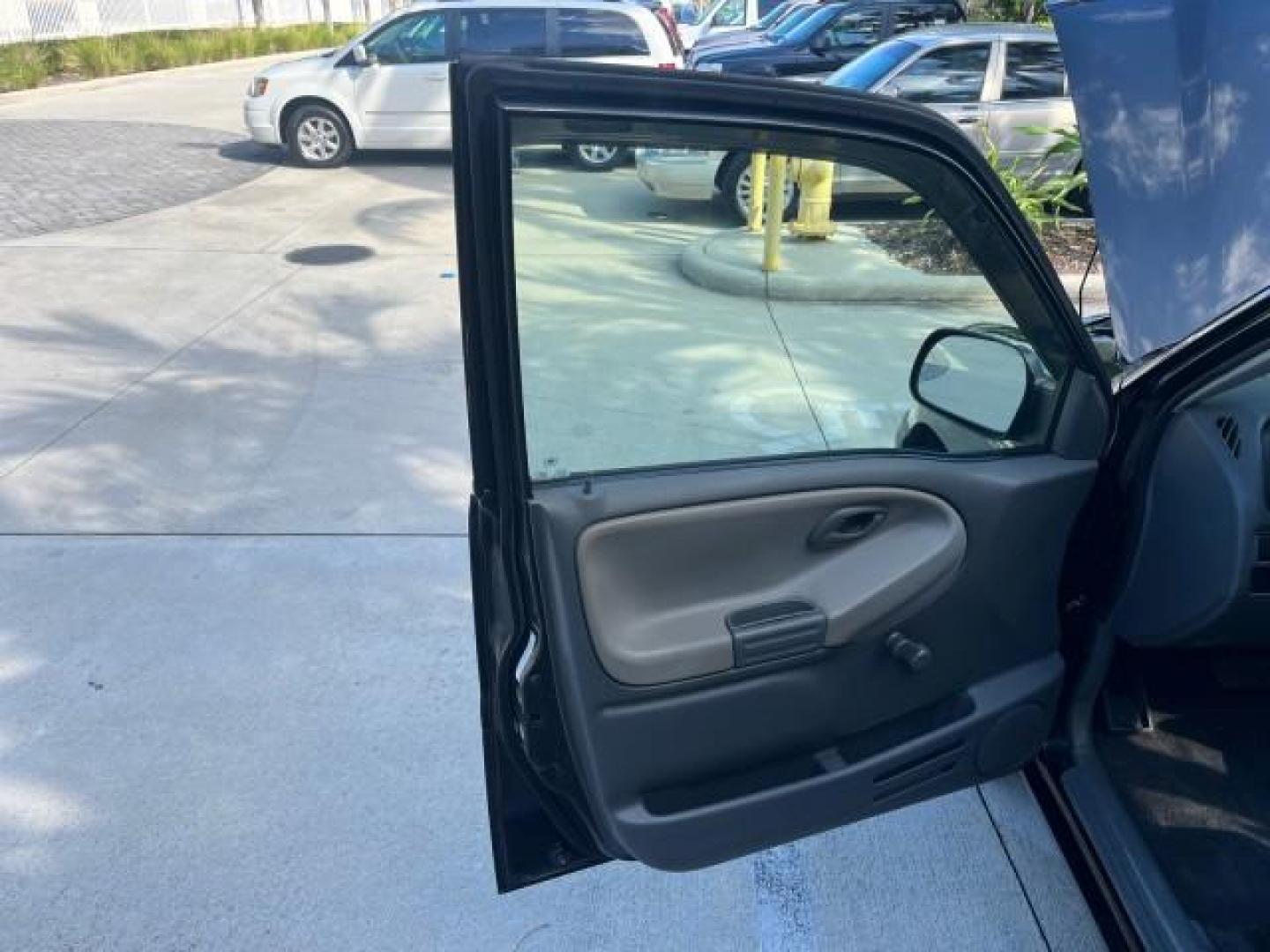 2004 Black /Medium Gray Chevrolet Tracker 4x4 loaded LOW MILES 73,735 (2CNBJ134246) with an 2.5L DOHC 24-Valve V6 Multi-Port Fuel Injection Engine engine, Automatic transmission, located at 4701 North Dixie Hwy, Pompano Beach, FL, 33064, (954) 422-2889, 26.240938, -80.123474 - OUR WEBPAGE FLORIDACARS1.COM HAS OVER 100 PHOTOS AND FREE CARFAX LINK 2004 CHEVROLET TRACKER ROAD READY 2.5L V6 VIN: 2CNBJ134246916181 NO ACCIDENTS 4 DOOR WAGON/SPORT UTILITY NO RECALLS 4X4 2.5L V6 F LOW MILES 73,735 GASOLINE ON DEMAND 4WD REAR WHEEL DRIVE W/ 4X4 20 SERVICE RECORDS 4WD Alloy Wheels - Photo#9