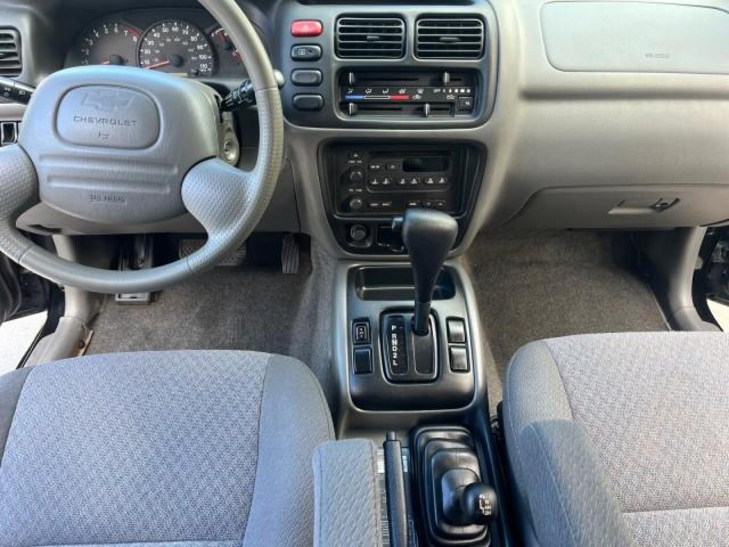 2004 Black /Medium Gray Chevrolet Tracker 4x4 loaded LOW MILES 73,735 (2CNBJ134246) with an 2.5L DOHC 24-Valve V6 Multi-Port Fuel Injection Engine engine, Automatic transmission, located at 4701 North Dixie Hwy, Pompano Beach, FL, 33064, (954) 422-2889, 26.240938, -80.123474 - OUR WEBPAGE FLORIDACARS1.COM HAS OVER 100 PHOTOS AND FREE CARFAX LINK 2004 CHEVROLET TRACKER ROAD READY 2.5L V6 VIN: 2CNBJ134246916181 NO ACCIDENTS 4 DOOR WAGON/SPORT UTILITY NO RECALLS 4X4 2.5L V6 F LOW MILES 73,735 GASOLINE ON DEMAND 4WD REAR WHEEL DRIVE W/ 4X4 20 SERVICE RECORDS 4WD Alloy Wheels - Photo#32