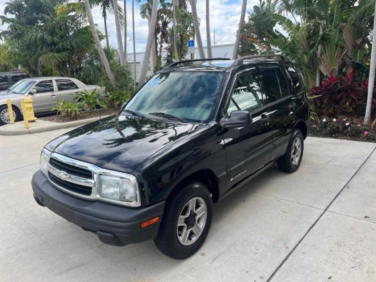 2004 Black /Medium Gray Chevrolet Tracker 4x4 loaded LOW MILES 73,735 (2CNBJ134246) with an 2.5L DOHC 24-Valve V6 Multi-Port Fuel Injection Engine engine, Automatic transmission, located at 4701 North Dixie Hwy, Pompano Beach, FL, 33064, (954) 422-2889, 26.240938, -80.123474 - OUR WEBPAGE FLORIDACARS1.COM HAS OVER 100 PHOTOS AND FREE CARFAX LINK 2004 CHEVROLET TRACKER ROAD READY 2.5L V6 VIN: 2CNBJ134246916181 NO ACCIDENTS 4 DOOR WAGON/SPORT UTILITY NO RECALLS 4X4 2.5L V6 F LOW MILES 73,735 GASOLINE ON DEMAND 4WD REAR WHEEL DRIVE W/ 4X4 20 SERVICE RECORDS 4WD Alloy Wheels - Photo#3