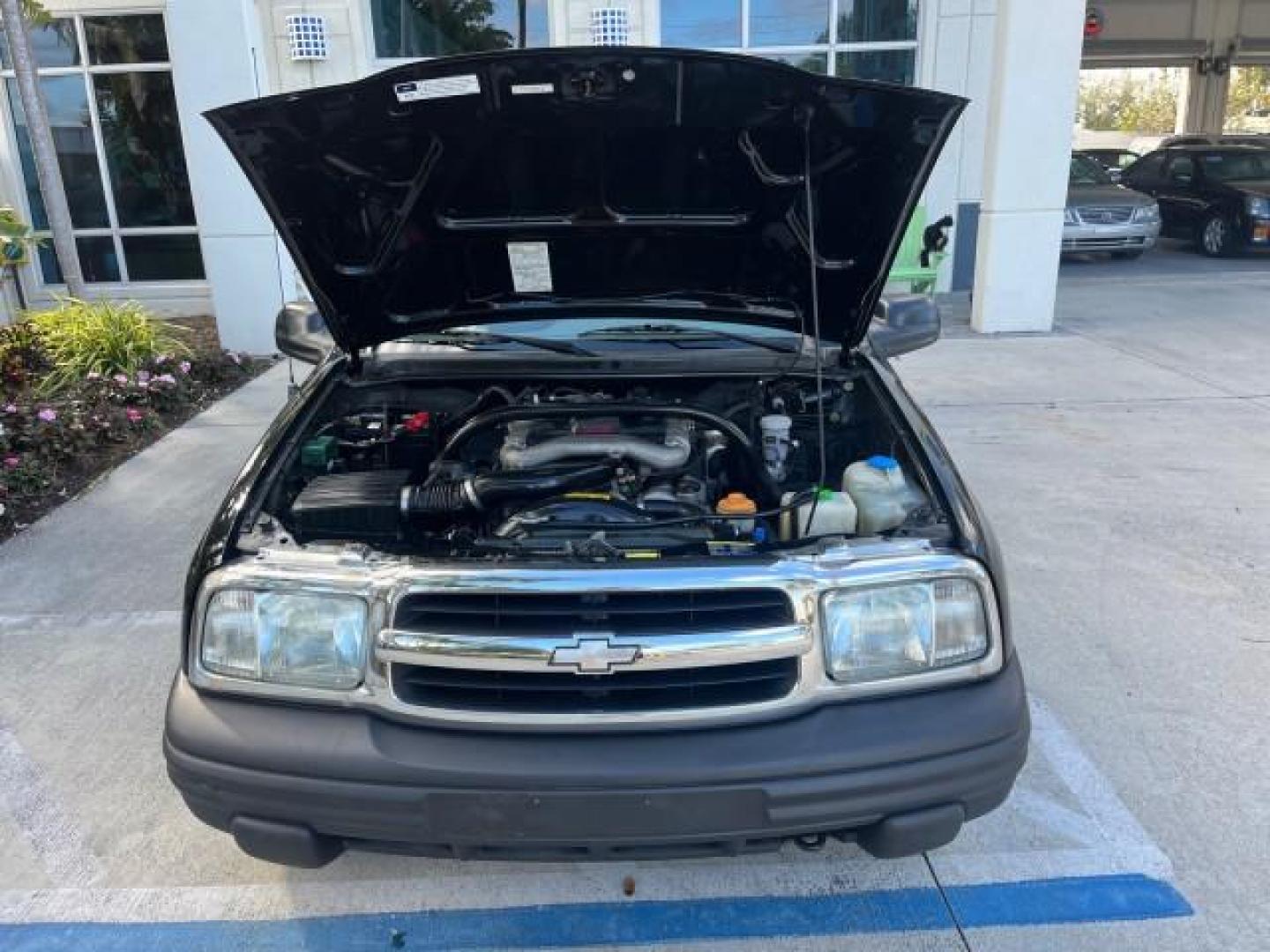 2004 Black /Medium Gray Chevrolet Tracker 4x4 loaded LOW MILES 73,735 (2CNBJ134246) with an 2.5L DOHC 24-Valve V6 Multi-Port Fuel Injection Engine engine, Automatic transmission, located at 4701 North Dixie Hwy, Pompano Beach, FL, 33064, (954) 422-2889, 26.240938, -80.123474 - OUR WEBPAGE FLORIDACARS1.COM HAS OVER 100 PHOTOS AND FREE CARFAX LINK 2004 CHEVROLET TRACKER ROAD READY 2.5L V6 VIN: 2CNBJ134246916181 NO ACCIDENTS 4 DOOR WAGON/SPORT UTILITY NO RECALLS 4X4 2.5L V6 F LOW MILES 73,735 GASOLINE ON DEMAND 4WD REAR WHEEL DRIVE W/ 4X4 20 SERVICE RECORDS 4WD Alloy Wheels - Photo#63