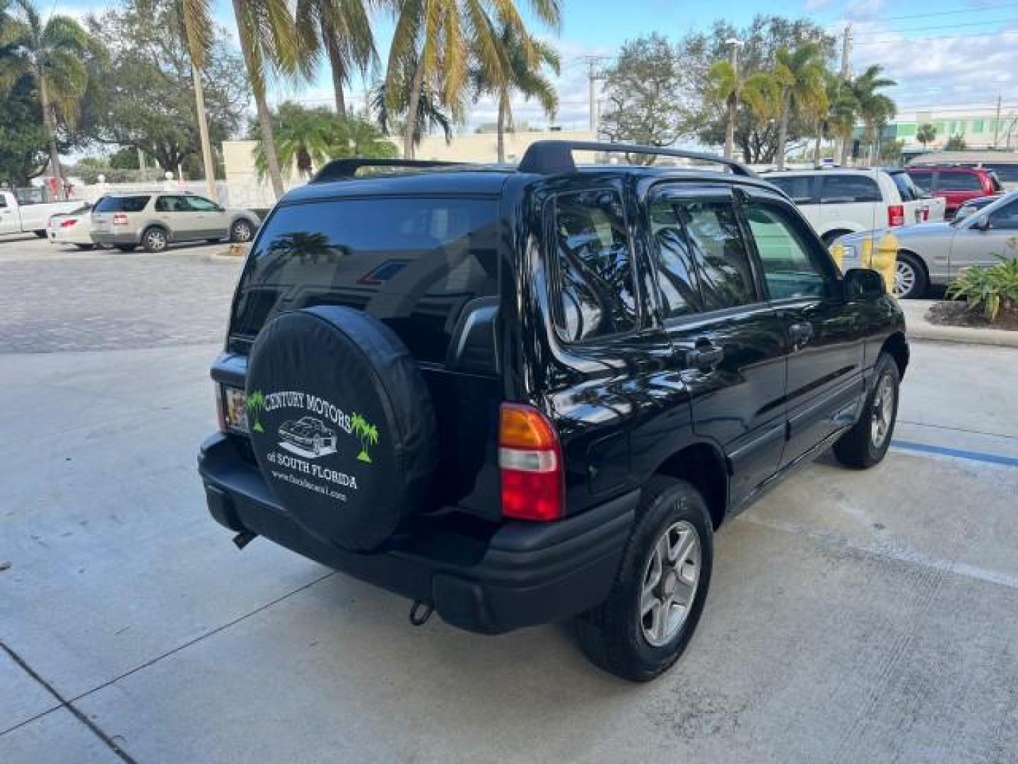 2004 Black /Medium Gray Chevrolet Tracker 4x4 loaded LOW MILES 73,735 (2CNBJ134246) with an 2.5L DOHC 24-Valve V6 Multi-Port Fuel Injection Engine engine, Automatic transmission, located at 4701 North Dixie Hwy, Pompano Beach, FL, 33064, (954) 422-2889, 26.240938, -80.123474 - OUR WEBPAGE FLORIDACARS1.COM HAS OVER 100 PHOTOS AND FREE CARFAX LINK 2004 CHEVROLET TRACKER ROAD READY 2.5L V6 VIN: 2CNBJ134246916181 NO ACCIDENTS 4 DOOR WAGON/SPORT UTILITY NO RECALLS 4X4 2.5L V6 F LOW MILES 73,735 GASOLINE ON DEMAND 4WD REAR WHEEL DRIVE W/ 4X4 20 SERVICE RECORDS 4WD Alloy Wheels - Photo#7