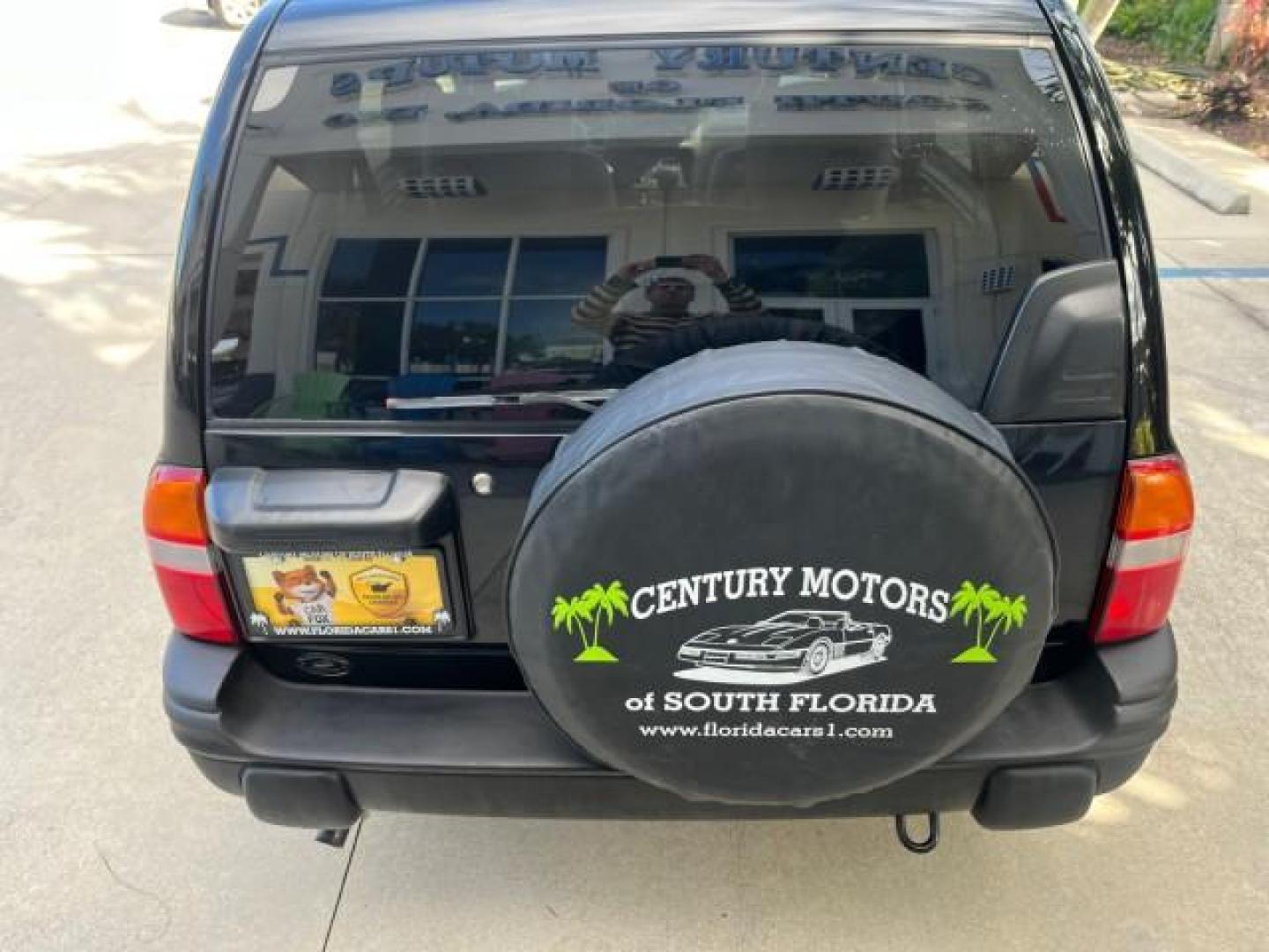 2004 Black /Medium Gray Chevrolet Tracker 4x4 loaded LOW MILES 73,735 (2CNBJ134246) with an 2.5L DOHC 24-Valve V6 Multi-Port Fuel Injection Engine engine, Automatic transmission, located at 4701 North Dixie Hwy, Pompano Beach, FL, 33064, (954) 422-2889, 26.240938, -80.123474 - OUR WEBPAGE FLORIDACARS1.COM HAS OVER 100 PHOTOS AND FREE CARFAX LINK 2004 CHEVROLET TRACKER ROAD READY 2.5L V6 VIN: 2CNBJ134246916181 NO ACCIDENTS 4 DOOR WAGON/SPORT UTILITY NO RECALLS 4X4 2.5L V6 F LOW MILES 73,735 GASOLINE ON DEMAND 4WD REAR WHEEL DRIVE W/ 4X4 20 SERVICE RECORDS 4WD Alloy Wheels - Photo#98