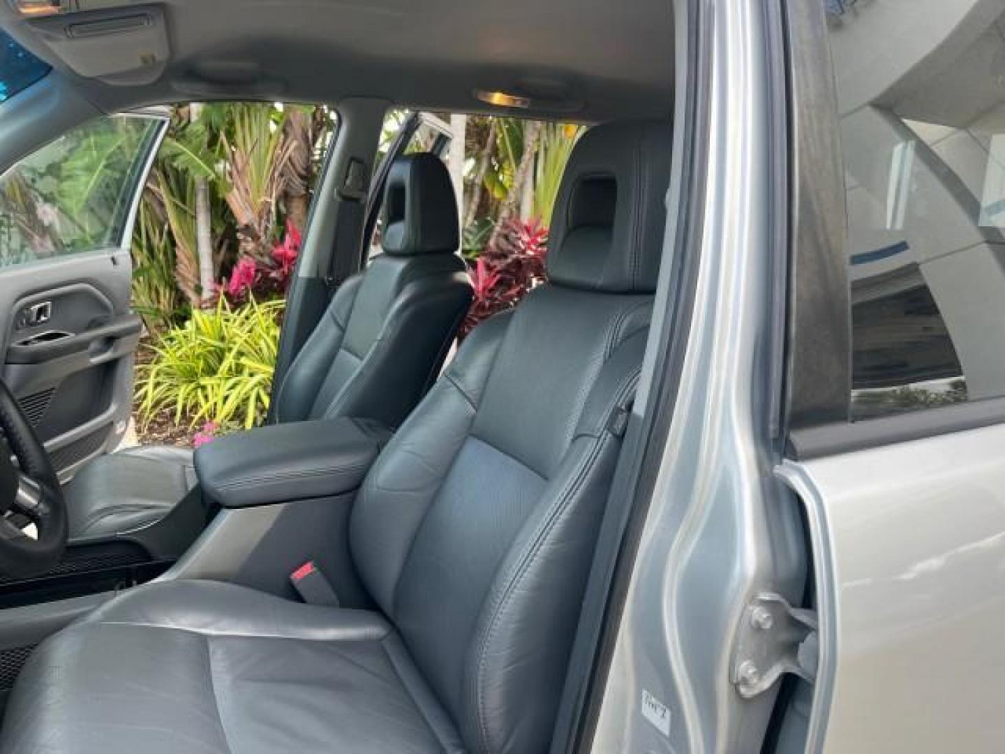 2004 Starlight Silver Metallic /Fern Honda Pilot EX LOW MILES 56,071 4X4 (2HKYF18514H) with an 3.5L SOHC PGM-FI 24-Valve VTEC V6 Engine engine, Automatic transmission, located at 4701 North Dixie Hwy, Pompano Beach, FL, 33064, (954) 422-2889, 26.240938, -80.123474 - OUR WEBPAGE FLORIDACARS1.COM HAS OVER 100 PHOTOS AND FREE CARFAX LINK 2004 HONDA PILOT EX-L ROAD READY 3.5L V6 VIN: 2HKYF18514H608187 NO ACCIDENTS 4 DOOR WAGON/SPORT UTILITY NO RECALLS 3.5L V6 F SOHC POWER MIRRORS FLORIDA OWNER GASOLINE POWER SEASTS 3 ROW LEATHER SEATS ALL WHEEL DRIVE 23 SERVICE REC - Photo#45