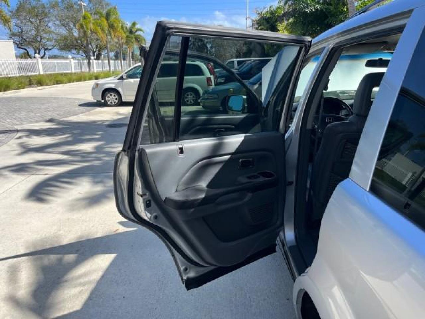 2004 Starlight Silver Metallic /Fern Honda Pilot EX LOW MILES 56,071 4X4 (2HKYF18514H) with an 3.5L SOHC PGM-FI 24-Valve VTEC V6 Engine engine, Automatic transmission, located at 4701 North Dixie Hwy, Pompano Beach, FL, 33064, (954) 422-2889, 26.240938, -80.123474 - OUR WEBPAGE FLORIDACARS1.COM HAS OVER 100 PHOTOS AND FREE CARFAX LINK 2004 HONDA PILOT EX-L ROAD READY 3.5L V6 VIN: 2HKYF18514H608187 NO ACCIDENTS 4 DOOR WAGON/SPORT UTILITY NO RECALLS 3.5L V6 F SOHC POWER MIRRORS FLORIDA OWNER GASOLINE POWER SEASTS 3 ROW LEATHER SEATS ALL WHEEL DRIVE 23 SERVICE REC - Photo#13