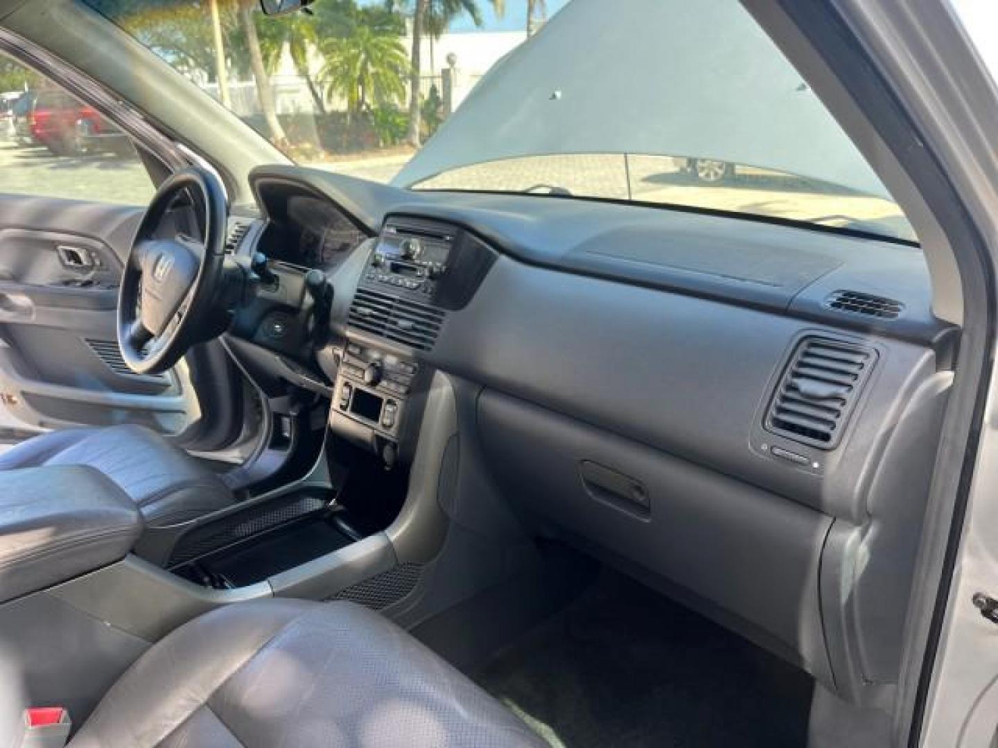 2004 Starlight Silver Metallic /Fern Honda Pilot EX LOW MILES 56,071 4X4 (2HKYF18514H) with an 3.5L SOHC PGM-FI 24-Valve VTEC V6 Engine engine, Automatic transmission, located at 4701 North Dixie Hwy, Pompano Beach, FL, 33064, (954) 422-2889, 26.240938, -80.123474 - OUR WEBPAGE FLORIDACARS1.COM HAS OVER 100 PHOTOS AND FREE CARFAX LINK 2004 HONDA PILOT EX-L ROAD READY 3.5L V6 VIN: 2HKYF18514H608187 NO ACCIDENTS 4 DOOR WAGON/SPORT UTILITY NO RECALLS 3.5L V6 F SOHC POWER MIRRORS FLORIDA OWNER GASOLINE POWER SEASTS 3 ROW LEATHER SEATS ALL WHEEL DRIVE 23 SERVICE REC - Photo#28