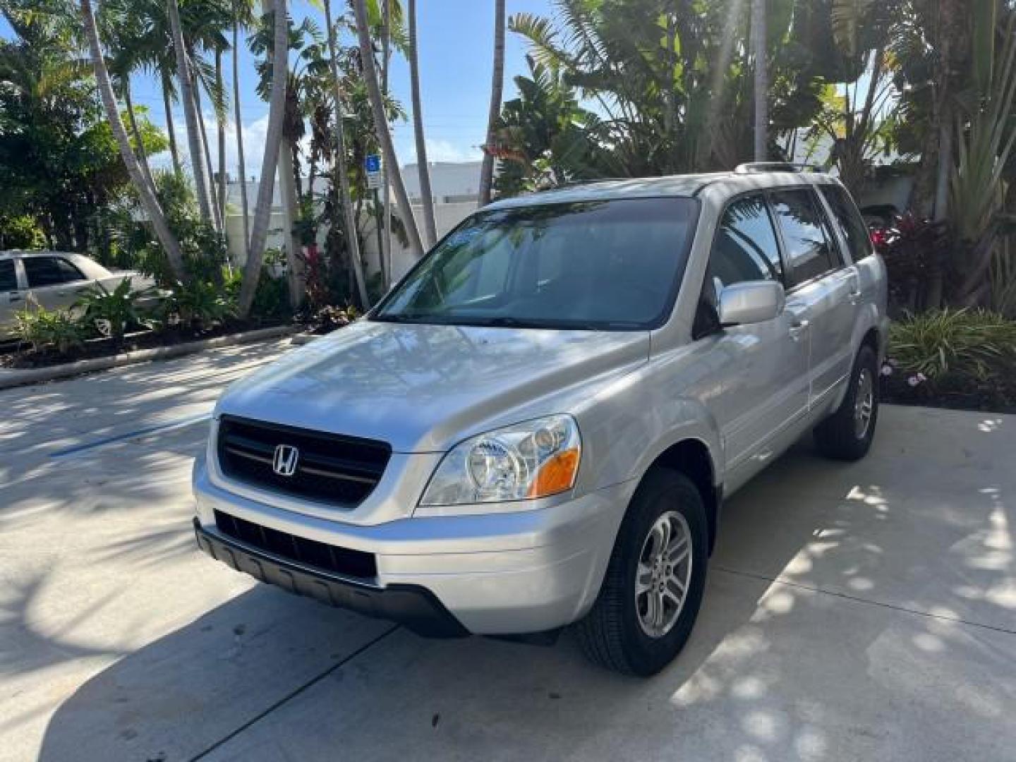 2004 Starlight Silver Metallic /Fern Honda Pilot EX LOW MILES 56,071 4X4 (2HKYF18514H) with an 3.5L SOHC PGM-FI 24-Valve VTEC V6 Engine engine, Automatic transmission, located at 4701 North Dixie Hwy, Pompano Beach, FL, 33064, (954) 422-2889, 26.240938, -80.123474 - OUR WEBPAGE FLORIDACARS1.COM HAS OVER 100 PHOTOS AND FREE CARFAX LINK 2004 HONDA PILOT EX-L ROAD READY 3.5L V6 VIN: 2HKYF18514H608187 NO ACCIDENTS 4 DOOR WAGON/SPORT UTILITY NO RECALLS 3.5L V6 F SOHC POWER MIRRORS FLORIDA OWNER GASOLINE POWER SEASTS 3 ROW LEATHER SEATS ALL WHEEL DRIVE 23 SERVICE REC - Photo#3