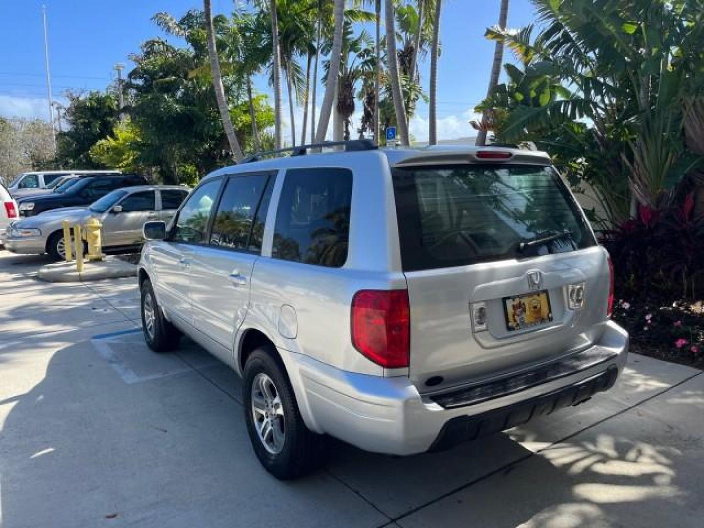 2004 Starlight Silver Metallic /Fern Honda Pilot EX LOW MILES 56,071 4X4 (2HKYF18514H) with an 3.5L SOHC PGM-FI 24-Valve VTEC V6 Engine engine, Automatic transmission, located at 4701 North Dixie Hwy, Pompano Beach, FL, 33064, (954) 422-2889, 26.240938, -80.123474 - OUR WEBPAGE FLORIDACARS1.COM HAS OVER 100 PHOTOS AND FREE CARFAX LINK 2004 HONDA PILOT EX-L ROAD READY 3.5L V6 VIN: 2HKYF18514H608187 NO ACCIDENTS 4 DOOR WAGON/SPORT UTILITY NO RECALLS 3.5L V6 F SOHC POWER MIRRORS FLORIDA OWNER GASOLINE POWER SEASTS 3 ROW LEATHER SEATS ALL WHEEL DRIVE 23 SERVICE REC - Photo#5