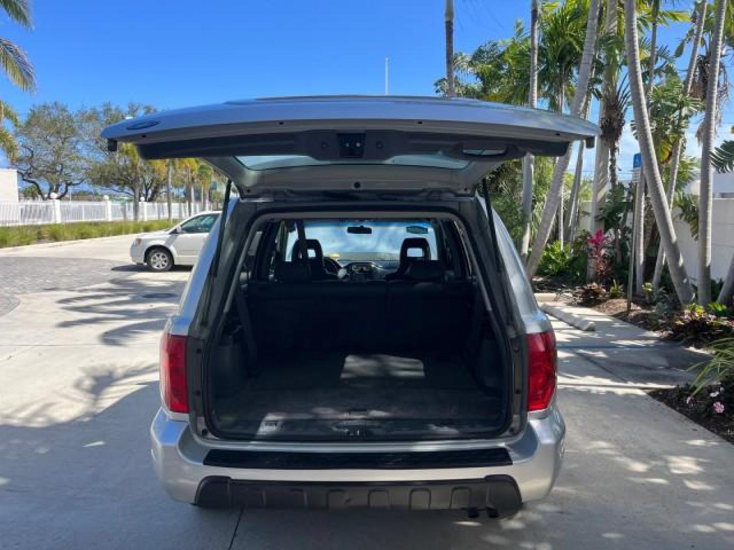 2004 Starlight Silver Metallic /Fern Honda Pilot EX LOW MILES 56,071 4X4 (2HKYF18514H) with an 3.5L SOHC PGM-FI 24-Valve VTEC V6 Engine engine, Automatic transmission, located at 4701 North Dixie Hwy, Pompano Beach, FL, 33064, (954) 422-2889, 26.240938, -80.123474 - OUR WEBPAGE FLORIDACARS1.COM HAS OVER 100 PHOTOS AND FREE CARFAX LINK 2004 HONDA PILOT EX-L ROAD READY 3.5L V6 VIN: 2HKYF18514H608187 NO ACCIDENTS 4 DOOR WAGON/SPORT UTILITY NO RECALLS 3.5L V6 F SOHC POWER MIRRORS FLORIDA OWNER GASOLINE POWER SEASTS 3 ROW LEATHER SEATS ALL WHEEL DRIVE 23 SERVICE REC - Photo#68