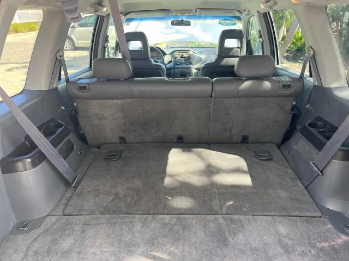 2004 Starlight Silver Metallic /Fern Honda Pilot EX LOW MILES 56,071 4X4 (2HKYF18514H) with an 3.5L SOHC PGM-FI 24-Valve VTEC V6 Engine engine, Automatic transmission, located at 4701 North Dixie Hwy, Pompano Beach, FL, 33064, (954) 422-2889, 26.240938, -80.123474 - OUR WEBPAGE FLORIDACARS1.COM HAS OVER 100 PHOTOS AND FREE CARFAX LINK 2004 HONDA PILOT EX-L ROAD READY 3.5L V6 VIN: 2HKYF18514H608187 NO ACCIDENTS 4 DOOR WAGON/SPORT UTILITY NO RECALLS 3.5L V6 F SOHC POWER MIRRORS FLORIDA OWNER GASOLINE POWER SEASTS 3 ROW LEATHER SEATS ALL WHEEL DRIVE 23 SERVICE REC - Photo#80