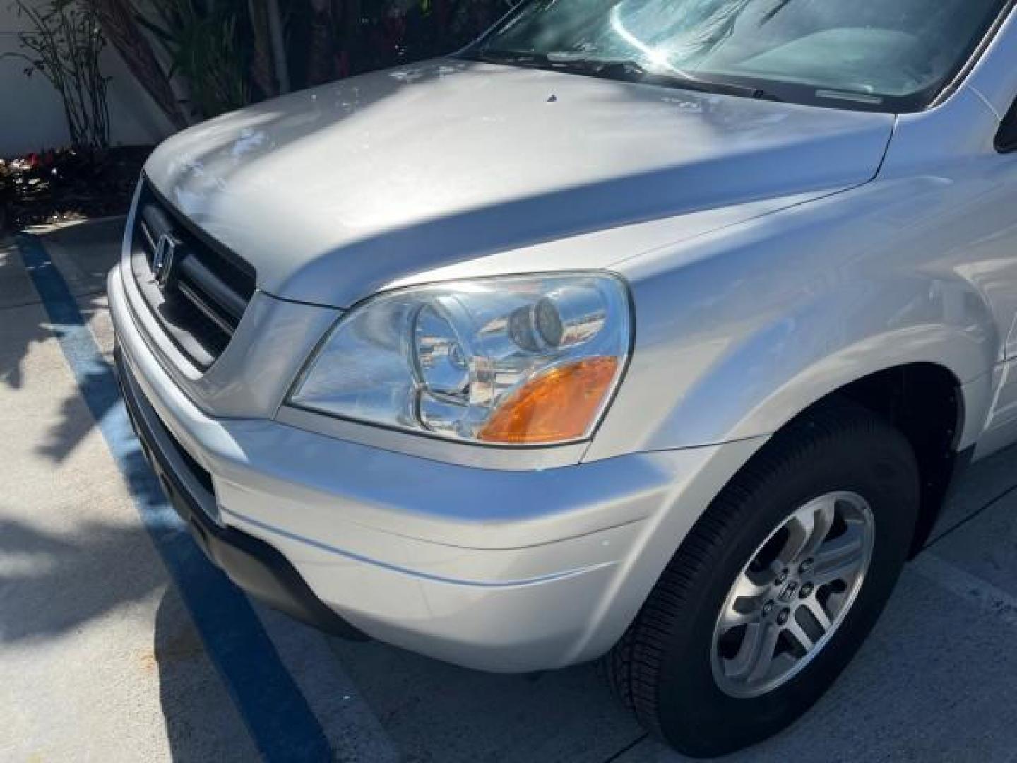 2004 Starlight Silver Metallic /Fern Honda Pilot EX LOW MILES 56,071 4X4 (2HKYF18514H) with an 3.5L SOHC PGM-FI 24-Valve VTEC V6 Engine engine, Automatic transmission, located at 4701 North Dixie Hwy, Pompano Beach, FL, 33064, (954) 422-2889, 26.240938, -80.123474 - OUR WEBPAGE FLORIDACARS1.COM HAS OVER 100 PHOTOS AND FREE CARFAX LINK 2004 HONDA PILOT EX-L ROAD READY 3.5L V6 VIN: 2HKYF18514H608187 NO ACCIDENTS 4 DOOR WAGON/SPORT UTILITY NO RECALLS 3.5L V6 F SOHC POWER MIRRORS FLORIDA OWNER GASOLINE POWER SEASTS 3 ROW LEATHER SEATS ALL WHEEL DRIVE 23 SERVICE REC - Photo#92