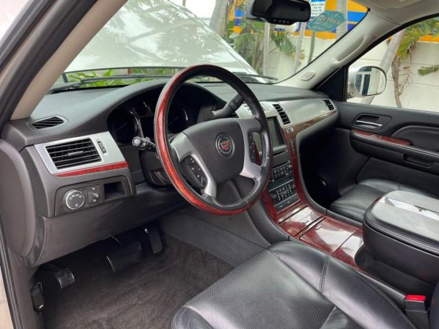 2007 Quicksilver /Ebony/Ebony Cadillac Escalade AWD SUNROOFLOW MILES 60,993 (1GYFK63877R) with an 6.2L Vortec 1000 VVT V8 SFI Engine engine, Automatic transmission, located at 4701 North Dixie Hwy, Pompano Beach, FL, 33064, (954) 422-2889, 26.240938, -80.123474 - 2007 CADILLAC ESCALADE NEW $ 59,100 ROAD READY VIN: 1GYFK63877R311160 NO ACCIDENTS NO RECALLS 4 DOOR WAGON/SPORT UTILITY LOW MILES 60,993 6.2L V8 6.2L V8 F ALL WHEEL DRIVE SUNROOF LEATHER SEATS GASOLINE 3 ROW LEATHER SEATS BLUETOOTH AWD ALL WHEEL DRIVE 20 SERVICE RECORDS PARKING SENSORS DUAL AC AWD - Photo#52