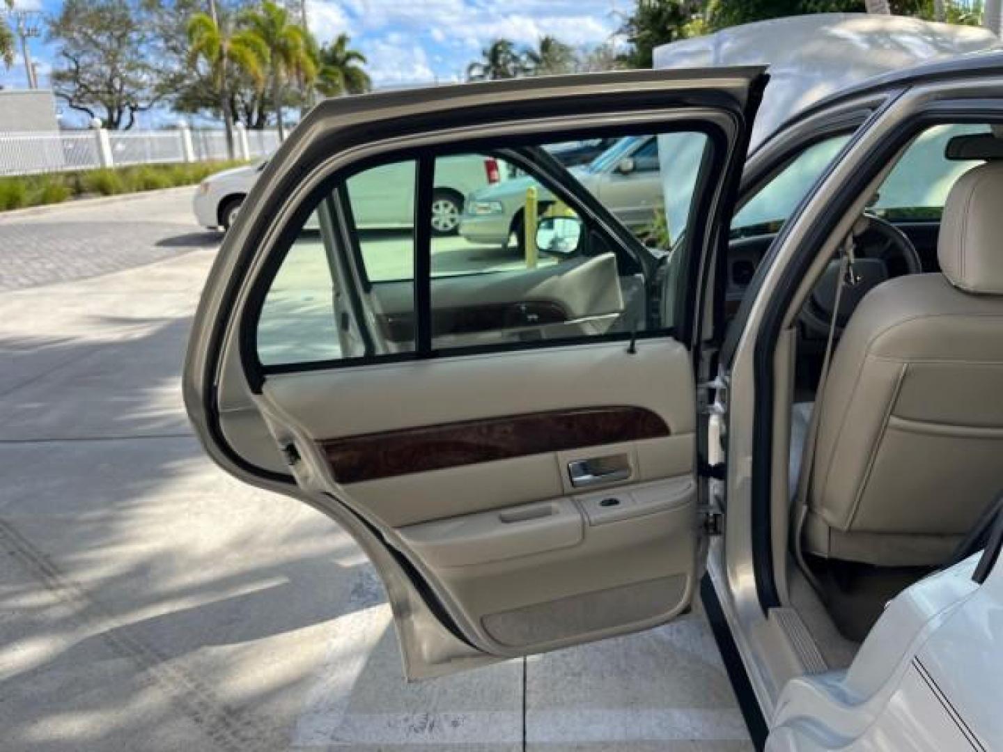 2008 Silver Birch Metallic /Light Camel Mercury Grand Marquis LS LOW MILES 61,045 (2MEFM75V98X) with an 4.6L OHC FFV V8 Engine engine, Automatic transmission, located at 4701 North Dixie Hwy, Pompano Beach, FL, 33064, (954) 422-2889, 26.240938, -80.123474 - 2008 MERCURY GRAND MARQUIS LS NEW $ 31,205 ROAD READY VIN: 2MEFM75V98X628291 NO ACCIDENTS 4.6L V8 SEDAN 4 DR LOW MILES 61,045 4.6L V8 F SOHC 15 SERVICE RECORDS FLEX FUEL POWER LEATHER SEATS REAR WHEEL DRIVE POWER MIRRORS Adaptive Headlights Adjustable Lumbar Support Auto-dimming Rearview Mirror Chro - Photo#13