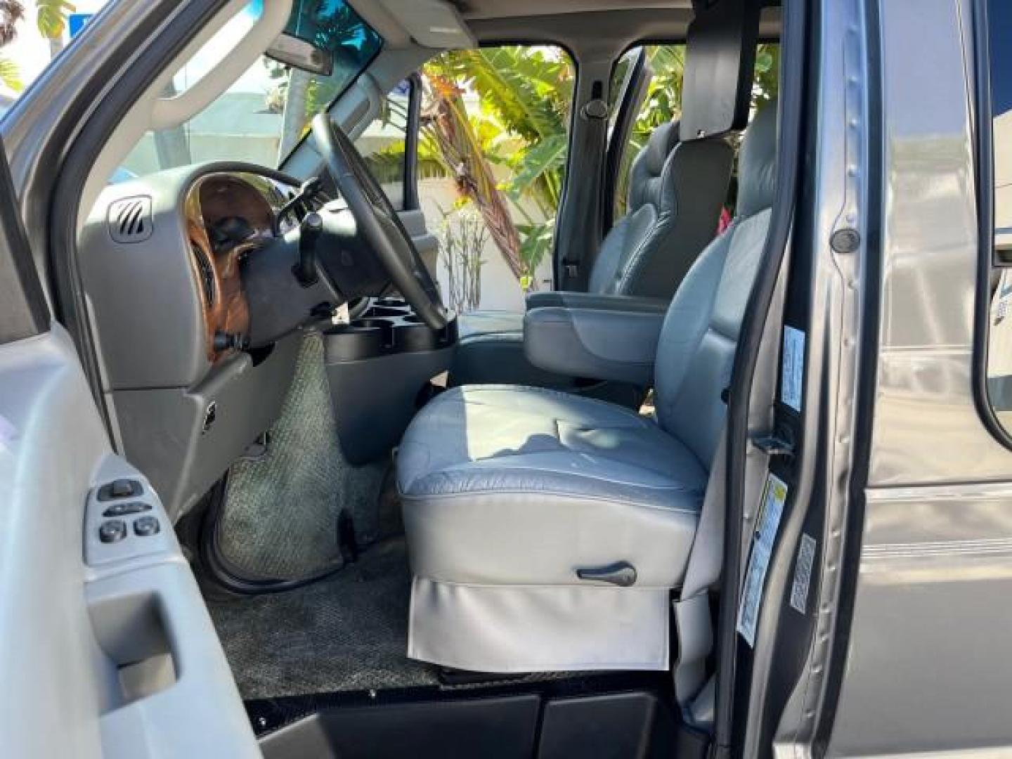 2008 Dark Shadow Grey Metallic /Medium flint Ford Econoline CONVERSION Van TUSCANY CONV LOW MILES 85,653 (1FDNE14W78D) with an 4.6L SOHC EFI V8 Triton Engine engine, Automatic transmission, located at 4701 North Dixie Hwy, Pompano Beach, FL, 33064, (954) 422-2889, 26.240938, -80.123474 - 2008 FORD ECONOLINE E150 TUSCANY CONVERSION ROAD READY 4.6L V8 VIN: 1FDNE14W78DA12545 NO ACCIDENTS NO RECALLS VAN POWER LEATHER SEATS 4.6L V8 F SOHC 16V POWER MIRRORS GASOLINE DVD ENTERTAINMENT 4 SERVICE RECORDS REAR WHEEL DRIVE BACK UP SENSORS LOW MILES 85,653 THIS IS ONE OF THE NICEST FORD CONVERS - Photo#10