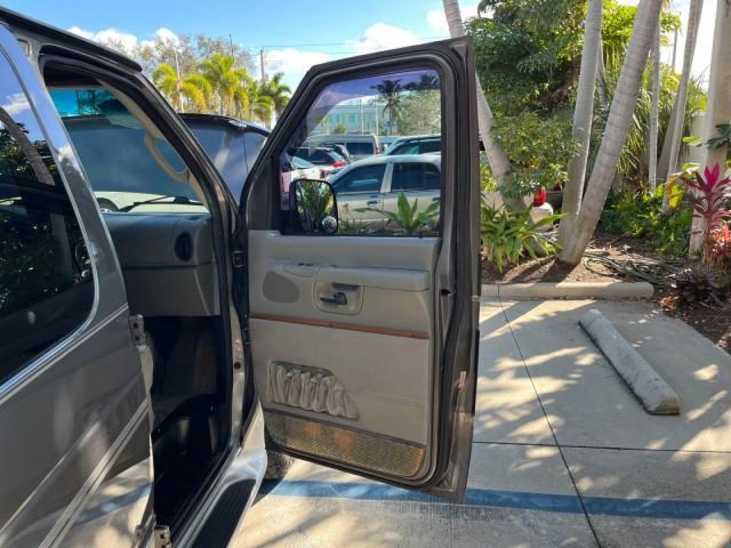 2008 Dark Shadow Grey Metallic /Medium flint Ford Econoline CONVERSION Van TUSCANY CONV LOW MILES 85,653 (1FDNE14W78D) with an 4.6L SOHC EFI V8 Triton Engine engine, Automatic transmission, located at 4701 North Dixie Hwy, Pompano Beach, FL, 33064, (954) 422-2889, 26.240938, -80.123474 - 2008 FORD ECONOLINE E150 TUSCANY CONVERSION ROAD READY 4.6L V8 VIN: 1FDNE14W78DA12545 NO ACCIDENTS NO RECALLS VAN POWER LEATHER SEATS 4.6L V8 F SOHC 16V POWER MIRRORS GASOLINE DVD ENTERTAINMENT 4 SERVICE RECORDS REAR WHEEL DRIVE BACK UP SENSORS LOW MILES 85,653 THIS IS ONE OF THE NICEST FORD CONVERS - Photo#11