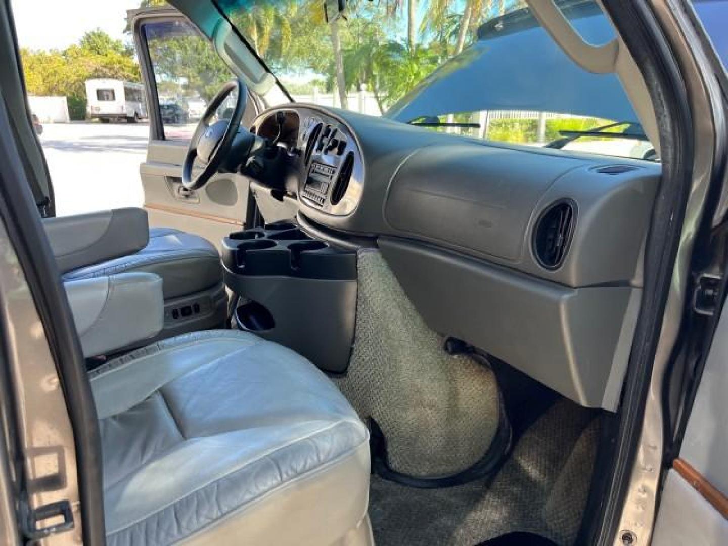 2008 Dark Shadow Grey Metallic /Medium flint Ford Econoline CONVERSION Van TUSCANY CONV LOW MILES 85,653 (1FDNE14W78D) with an 4.6L SOHC EFI V8 Triton Engine engine, Automatic transmission, located at 4701 North Dixie Hwy, Pompano Beach, FL, 33064, (954) 422-2889, 26.240938, -80.123474 - 2008 FORD ECONOLINE E150 TUSCANY CONVERSION ROAD READY 4.6L V8 VIN: 1FDNE14W78DA12545 NO ACCIDENTS NO RECALLS VAN POWER LEATHER SEATS 4.6L V8 F SOHC 16V POWER MIRRORS GASOLINE DVD ENTERTAINMENT 4 SERVICE RECORDS REAR WHEEL DRIVE BACK UP SENSORS LOW MILES 85,653 THIS IS ONE OF THE NICEST FORD CONVERS - Photo#26