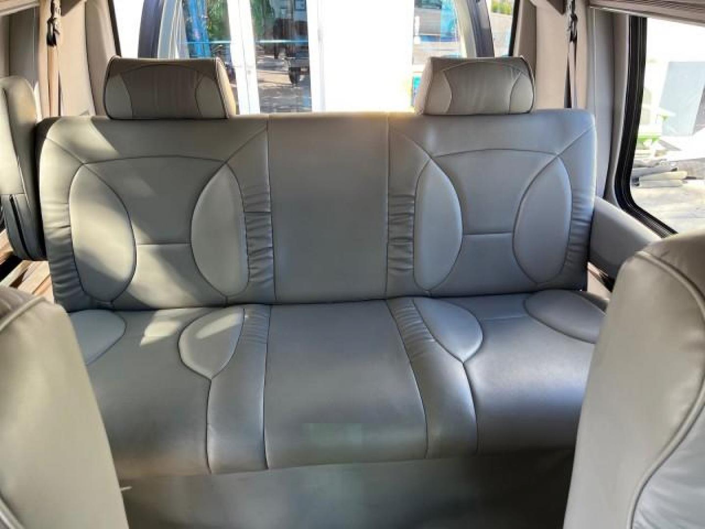 2008 Dark Shadow Grey Metallic /Medium flint Ford Econoline CONVERSION Van TUSCANY CONV LOW MILES 85,653 (1FDNE14W78D) with an 4.6L SOHC EFI V8 Triton Engine engine, Automatic transmission, located at 4701 North Dixie Hwy, Pompano Beach, FL, 33064, (954) 422-2889, 26.240938, -80.123474 - 2008 FORD ECONOLINE E150 TUSCANY CONVERSION ROAD READY 4.6L V8 VIN: 1FDNE14W78DA12545 NO ACCIDENTS NO RECALLS VAN POWER LEATHER SEATS 4.6L V8 F SOHC 16V POWER MIRRORS GASOLINE DVD ENTERTAINMENT 4 SERVICE RECORDS REAR WHEEL DRIVE BACK UP SENSORS LOW MILES 85,653 THIS IS ONE OF THE NICEST FORD CONVERS - Photo#33